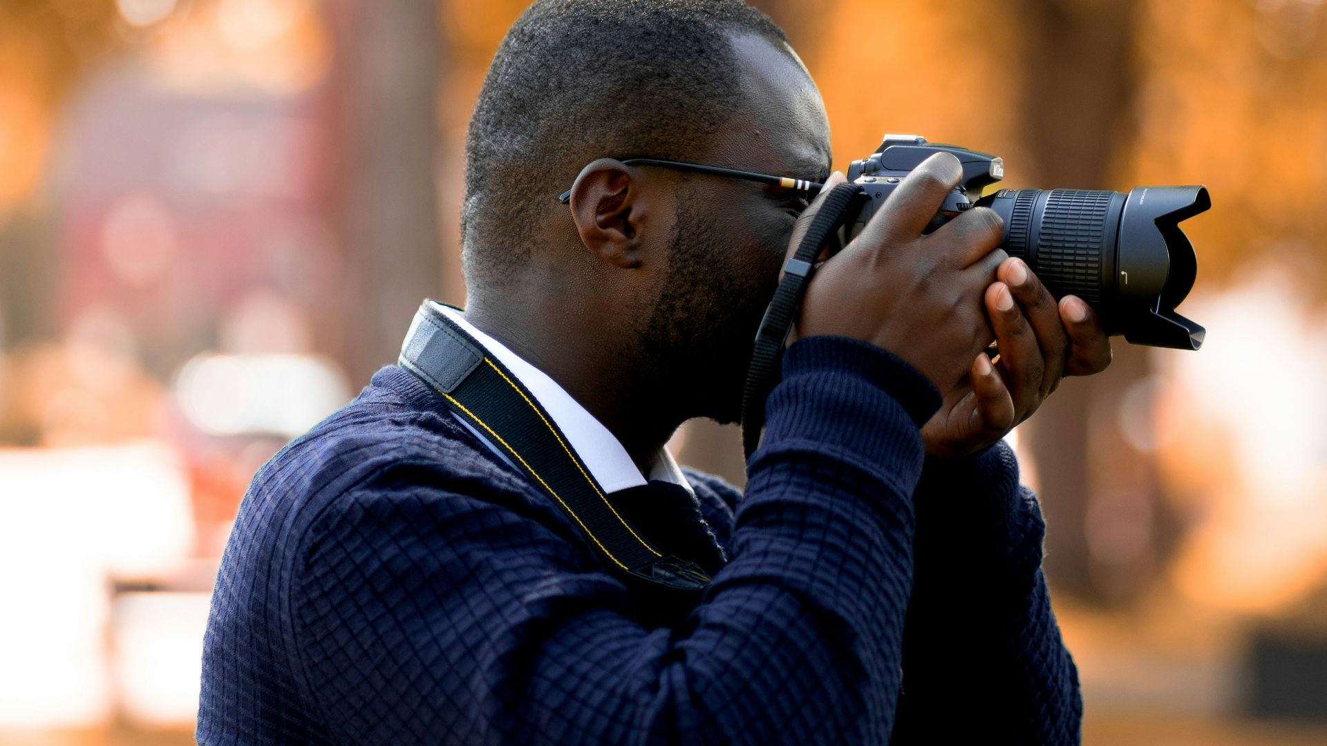 a person holding a camera