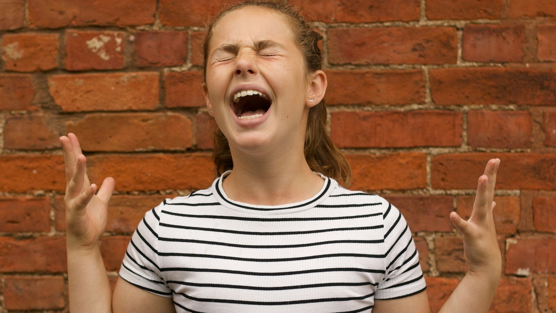 woman wearing black and white striped shirt