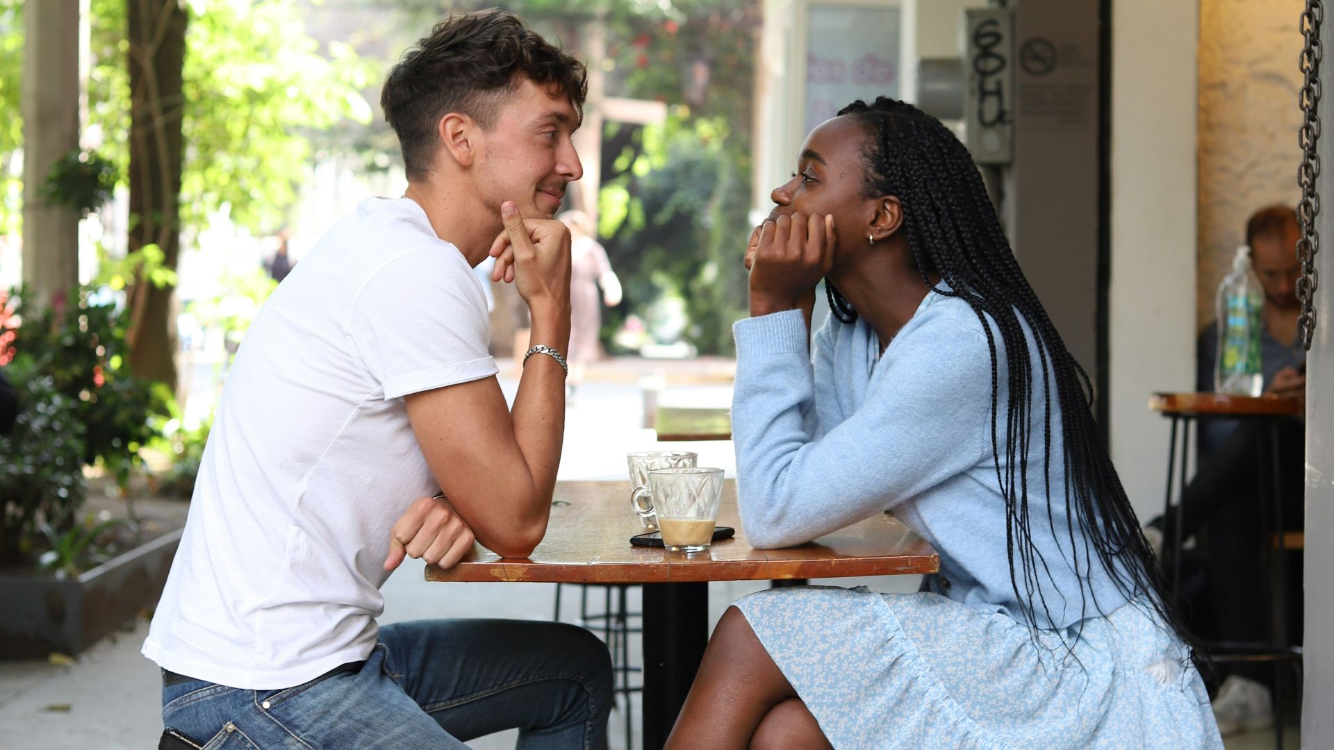 a man and a woman sitting at a table