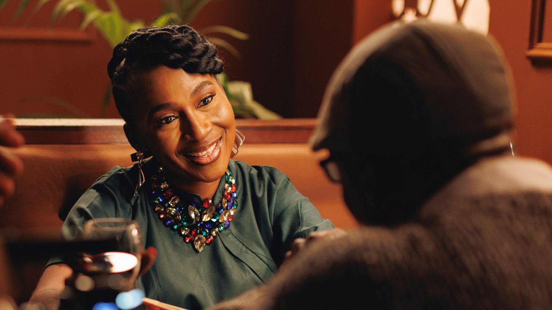 A couple enjoys a dinner date at a restaurant.