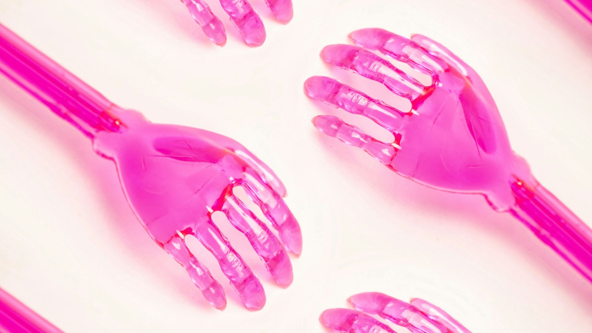 a close up of a bunch of pink combs