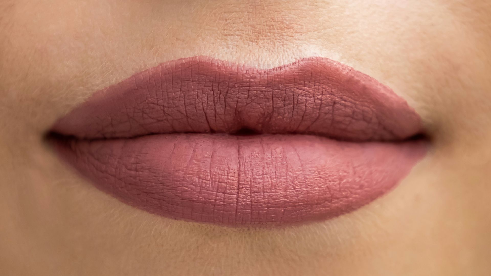 a close up of a woman's lips and nose