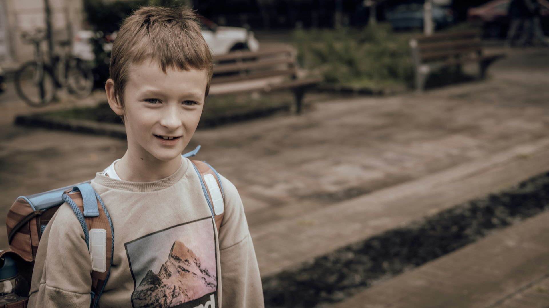 a boy with a backpack