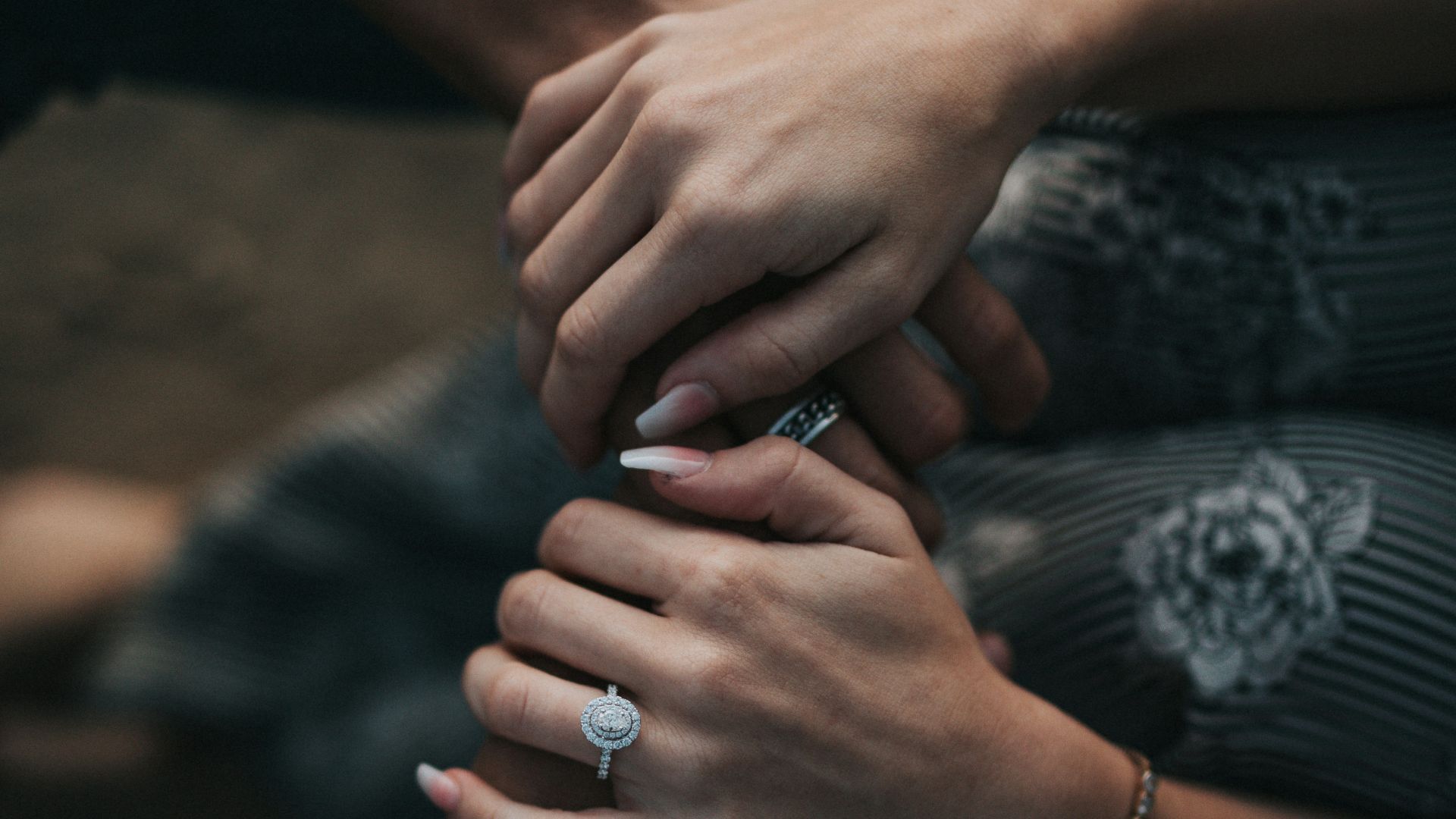 man and woman holding each others hands