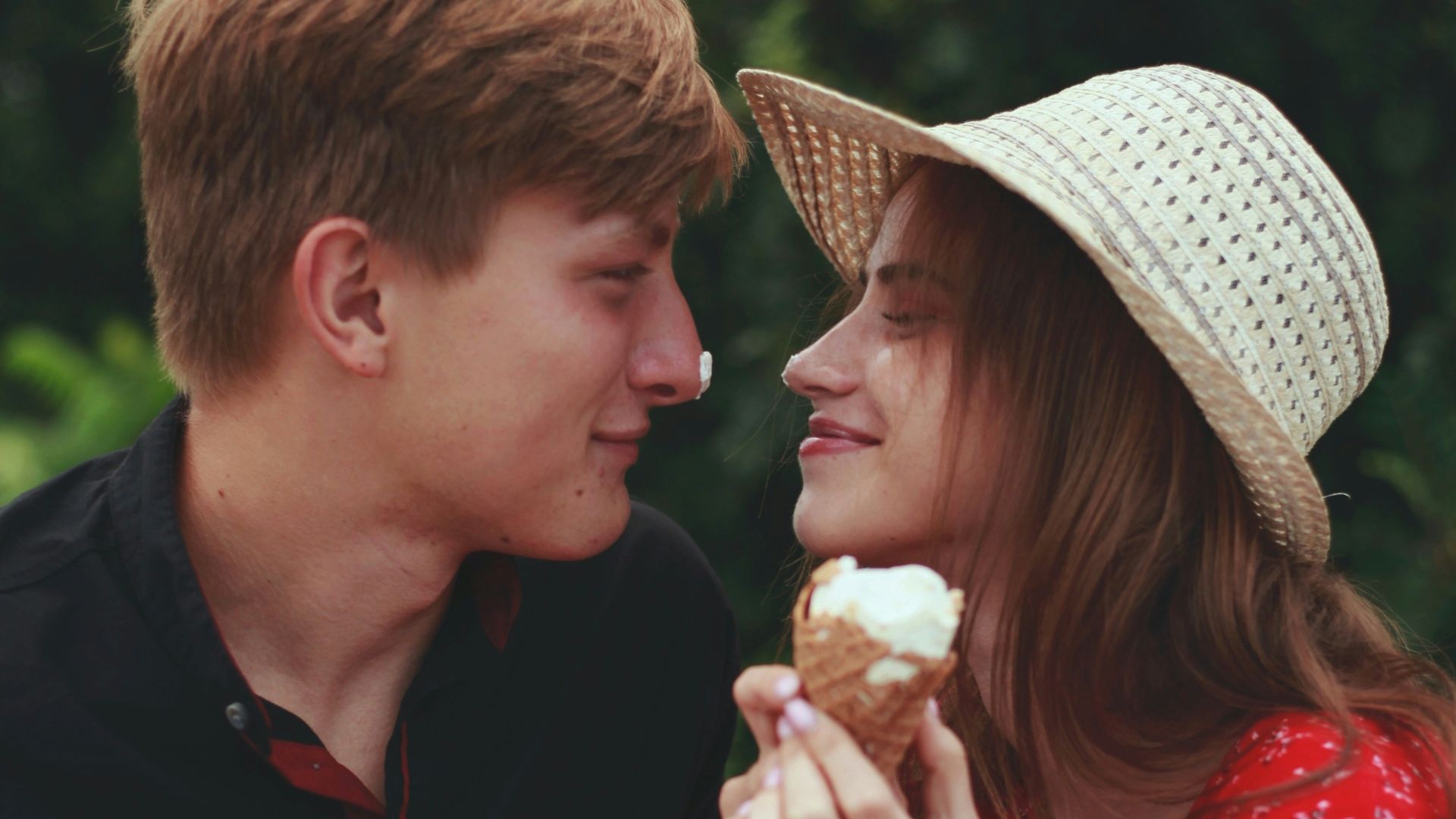 a man and woman eating ice cream