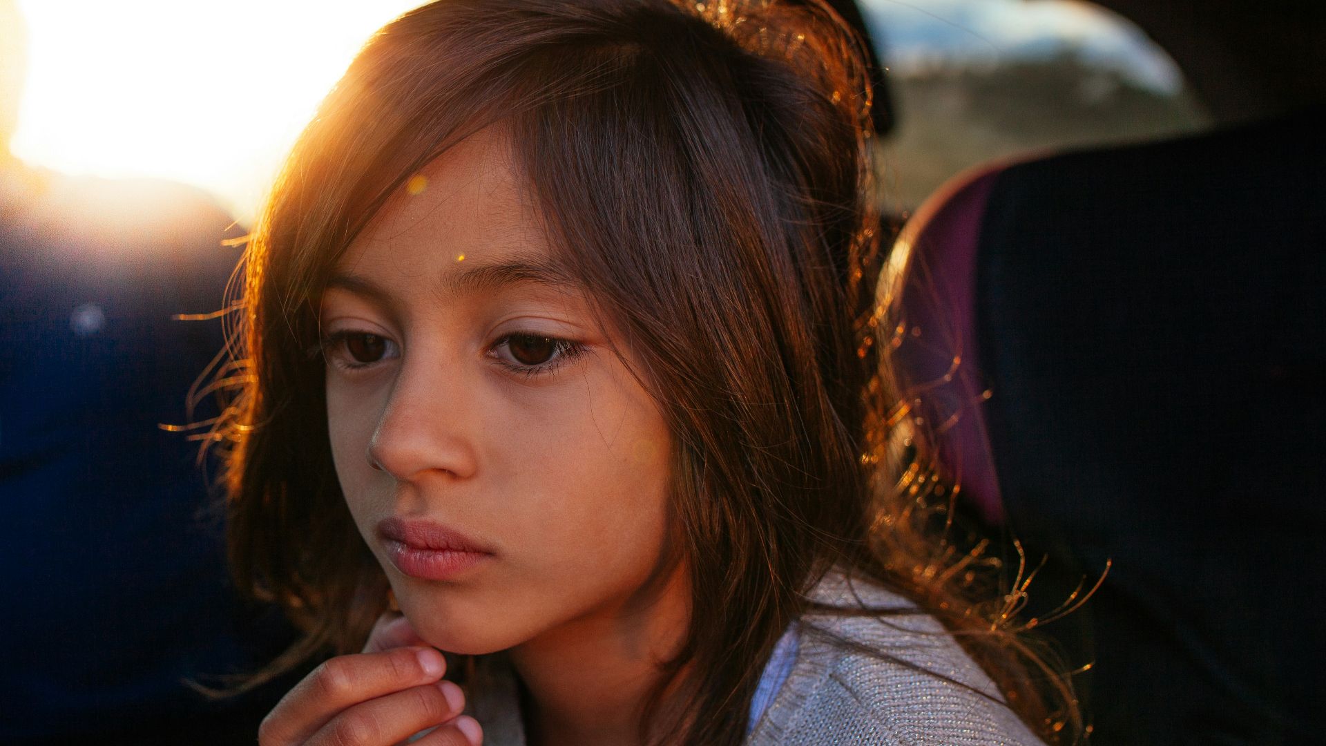 girl sitting inside car