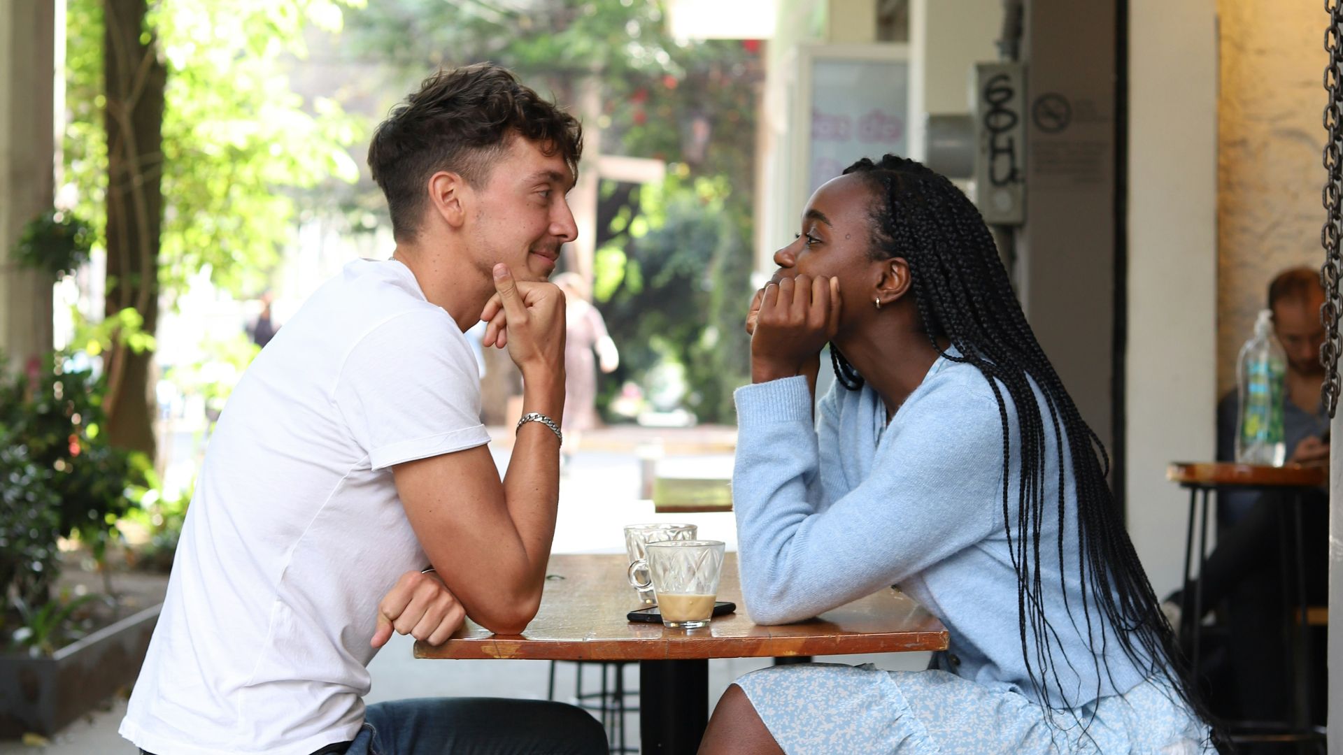 a man and a woman sitting at a table