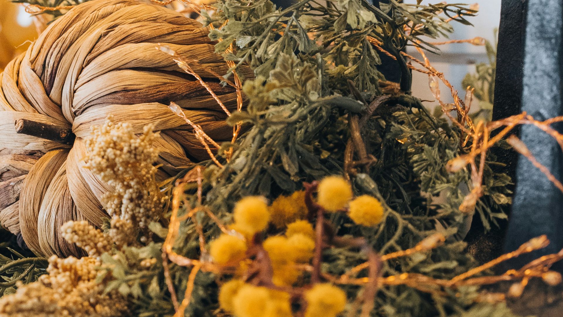 a mirror sitting on top of a wooden shelf