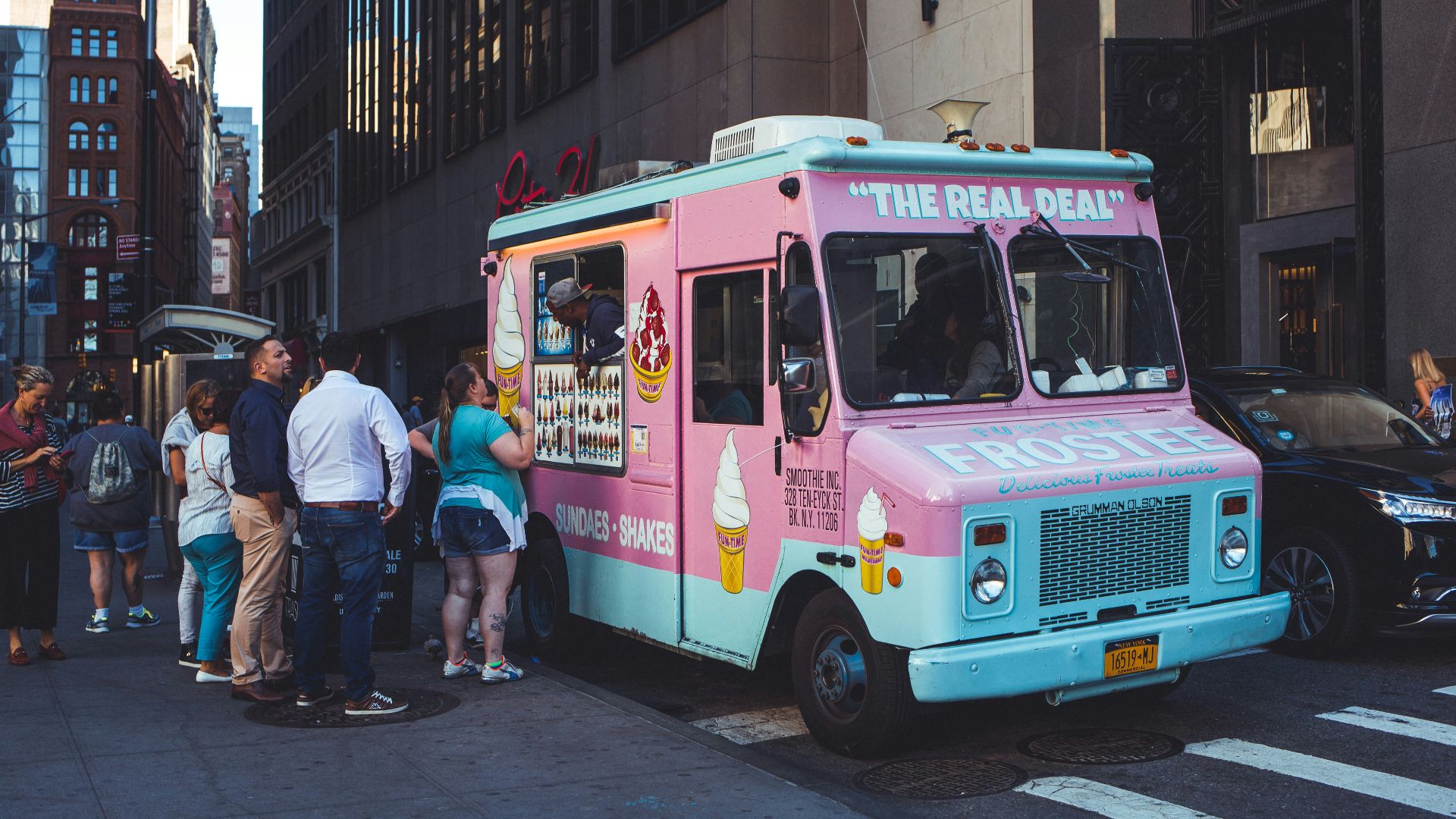 people walking on street during night time