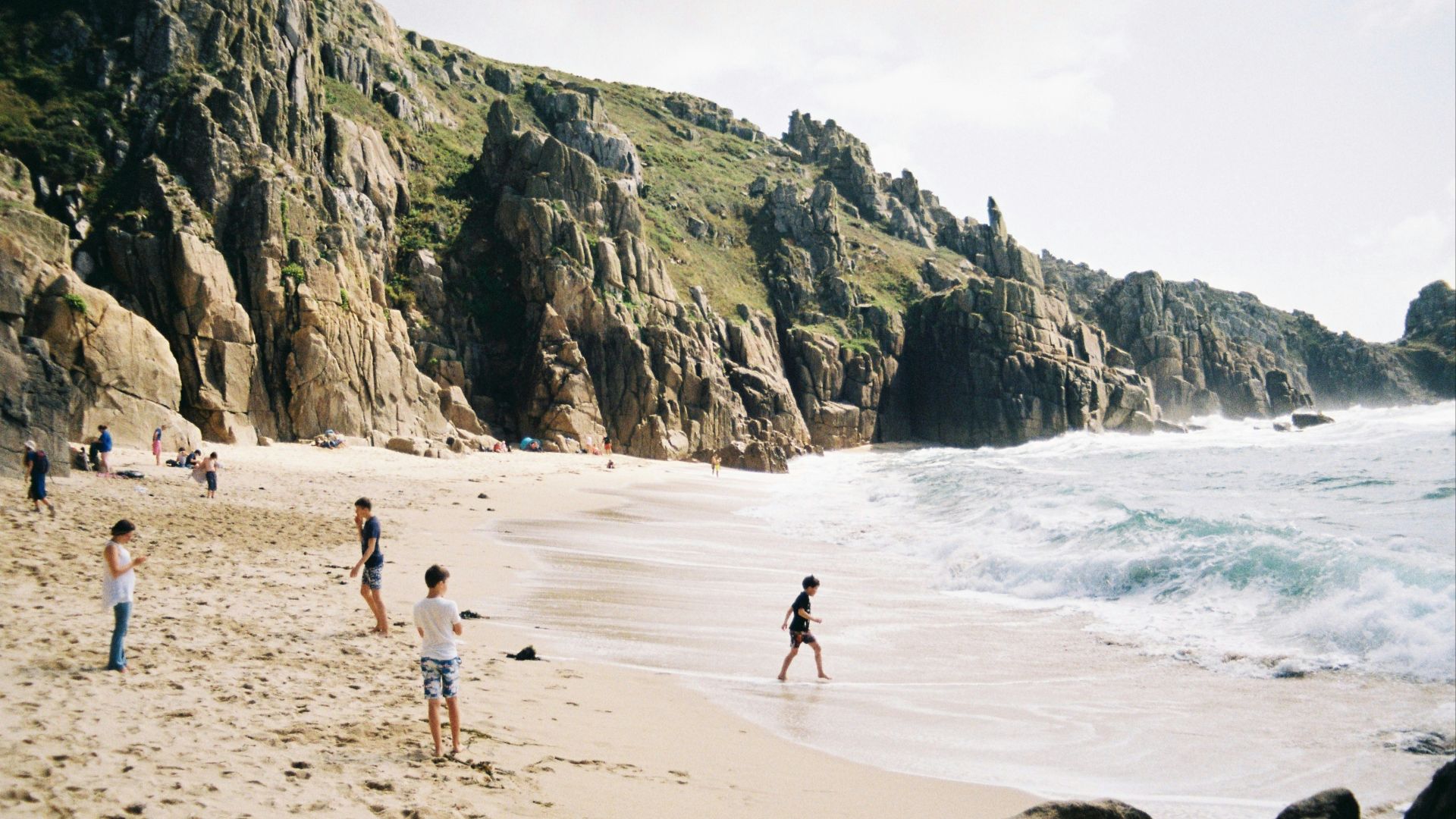 people walking on beach during daytime