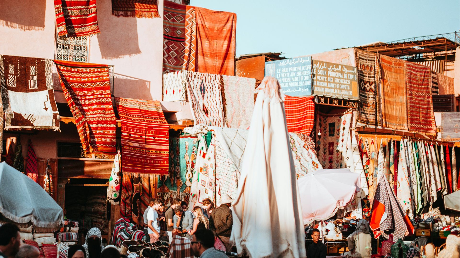 assorted-color textiles hanging on roof