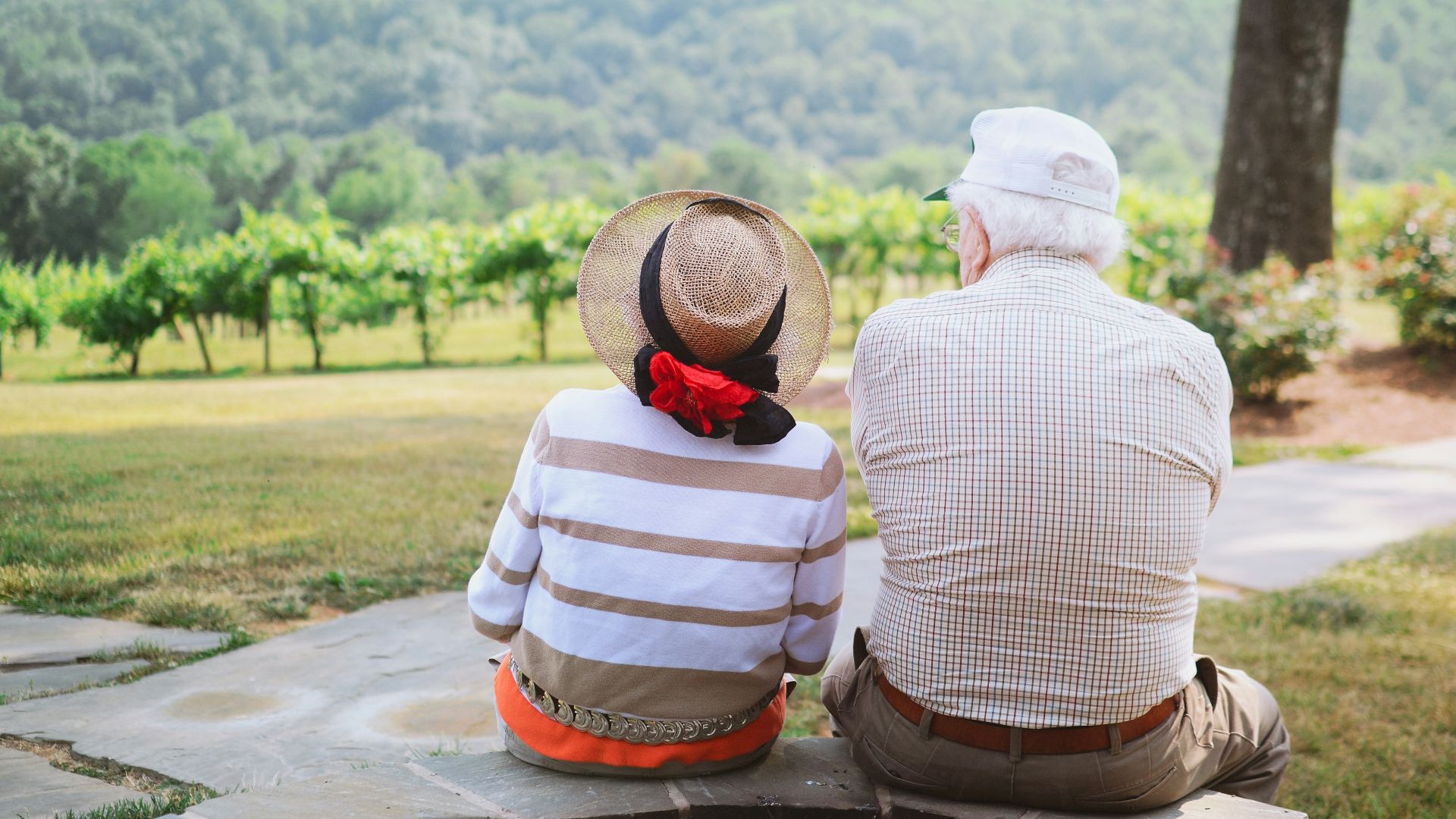 couple sitting on pathway