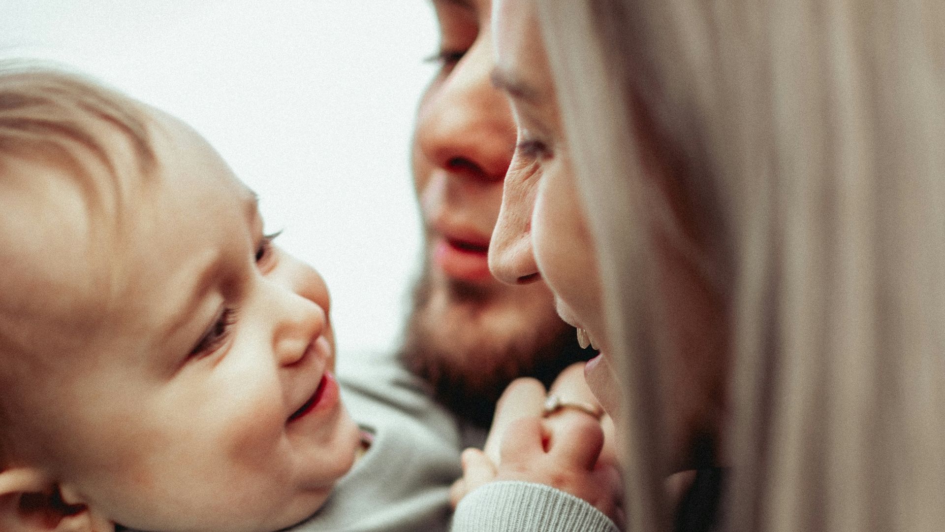 a person holding a baby