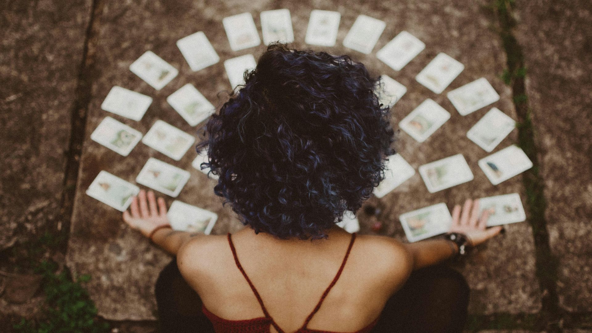 a person with a large pile of paper on the head