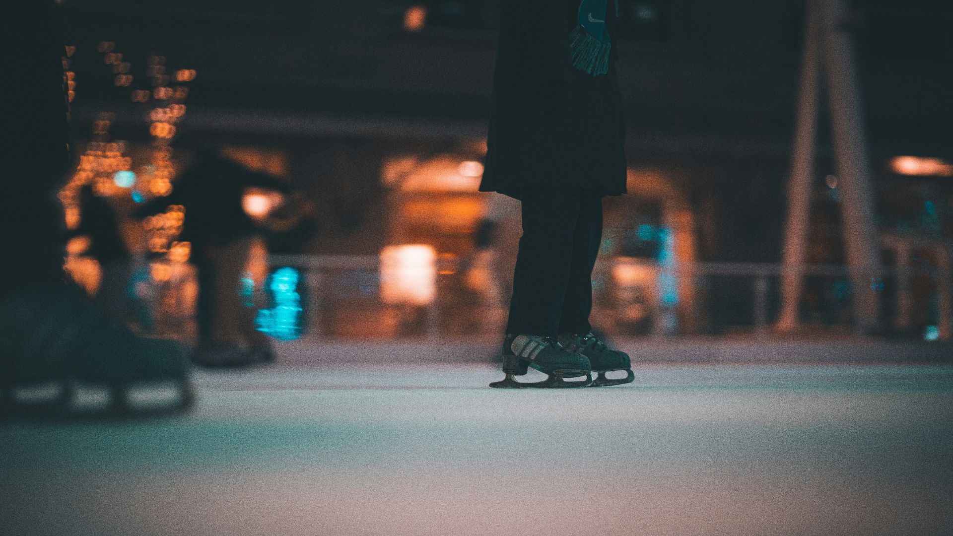 a person standing on top of a skateboard on a street