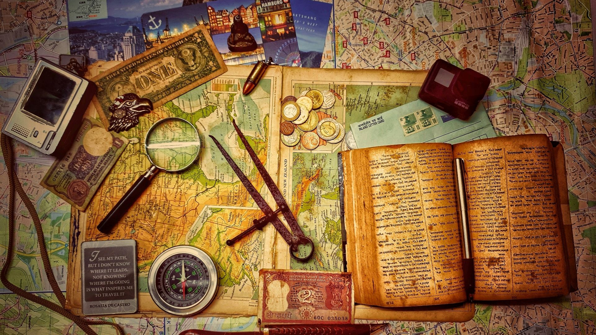 brown wooden scissors on brown and white book