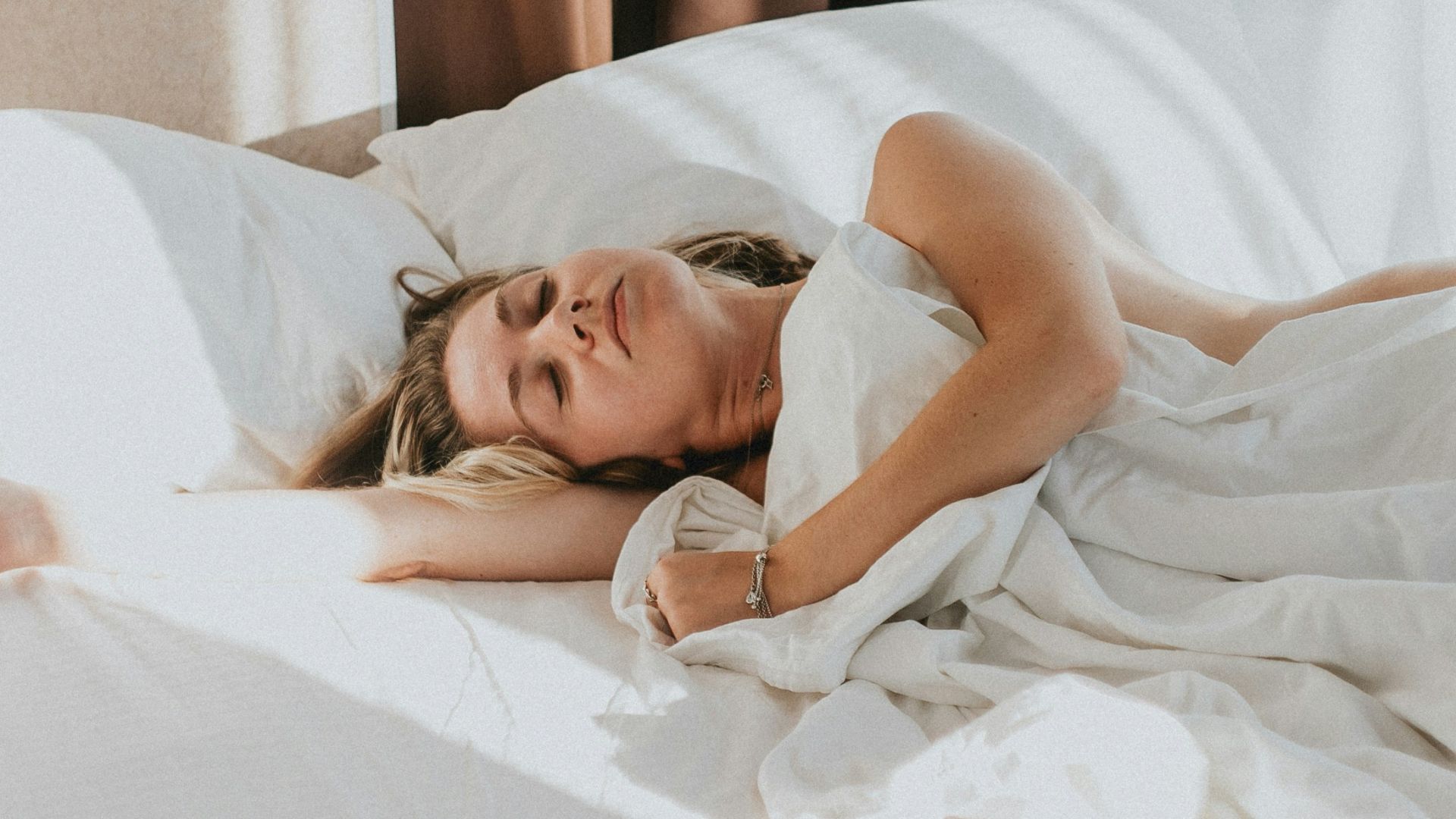a person lying in a bed