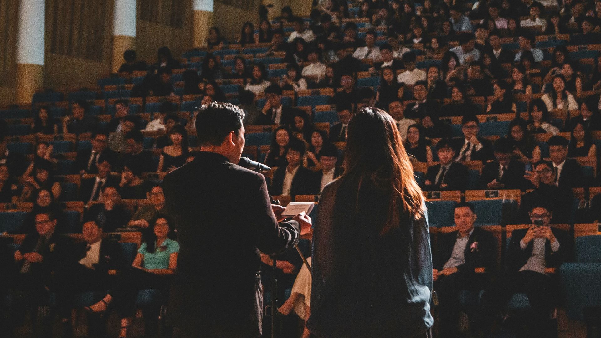 people sitting on chair inside room