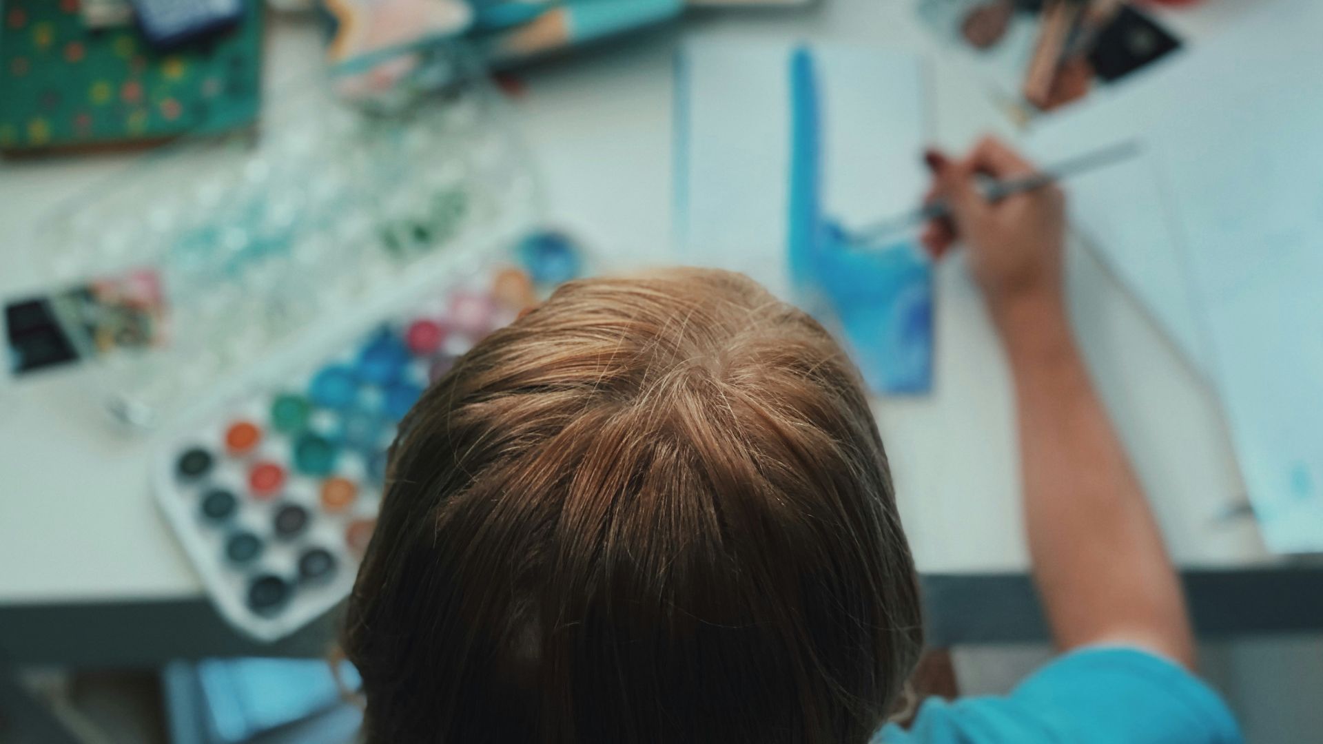 person playing with a game cards