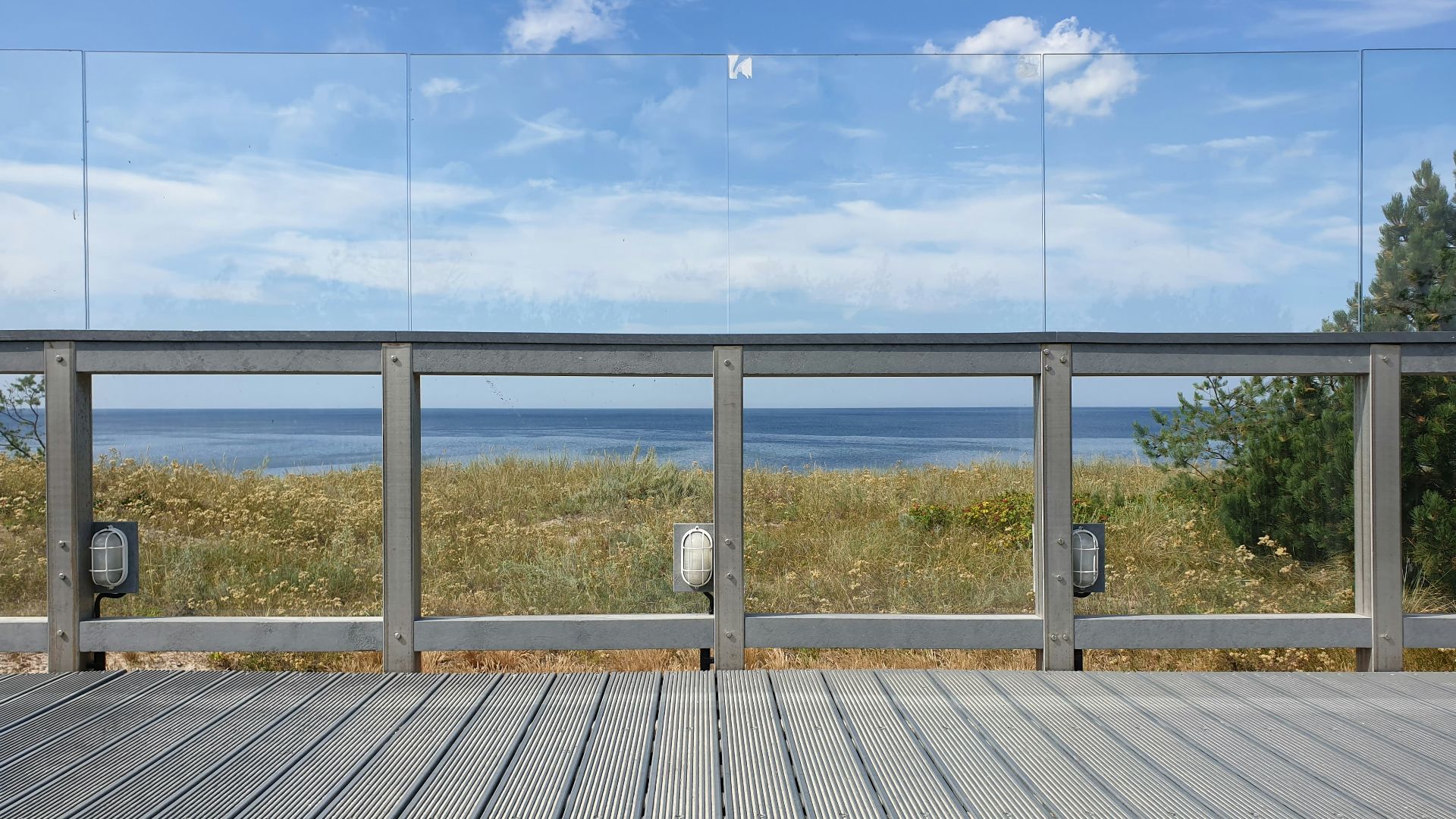 gray wooden dock under cloudy sky during daytime
