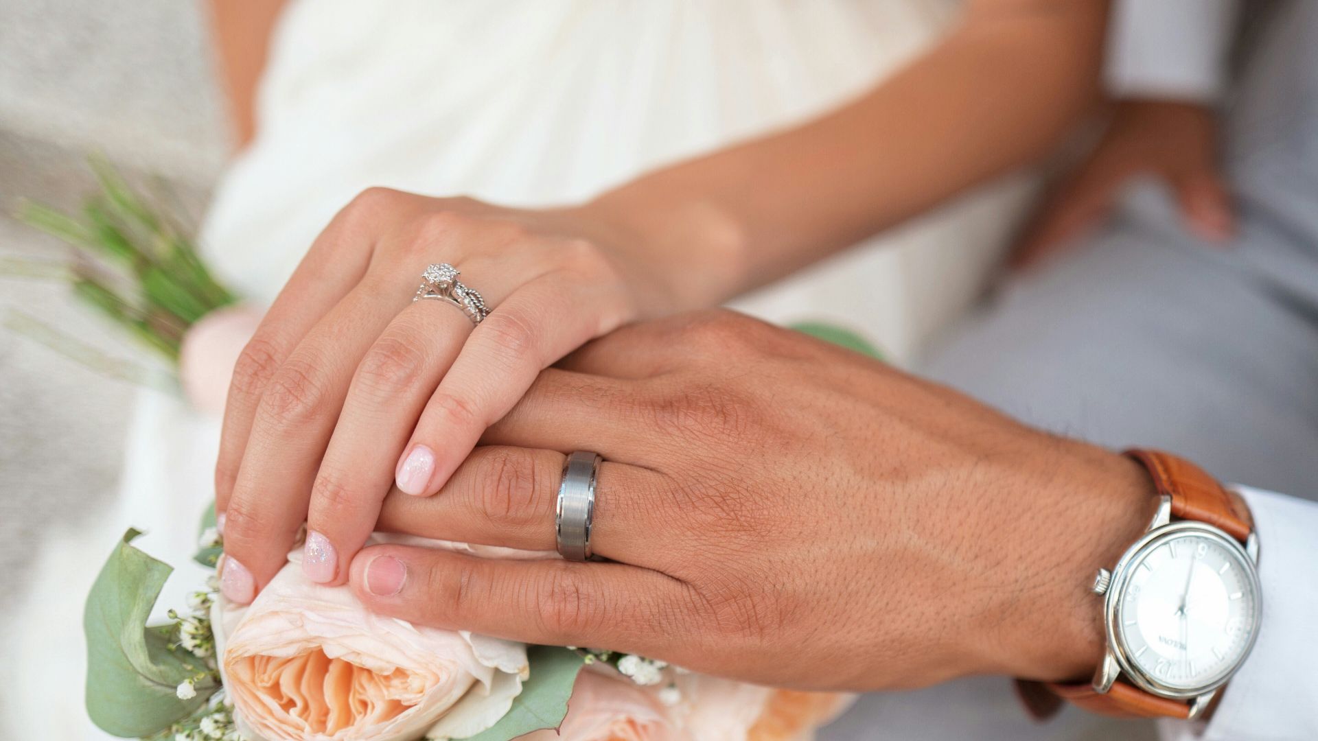 man and woman holding hands