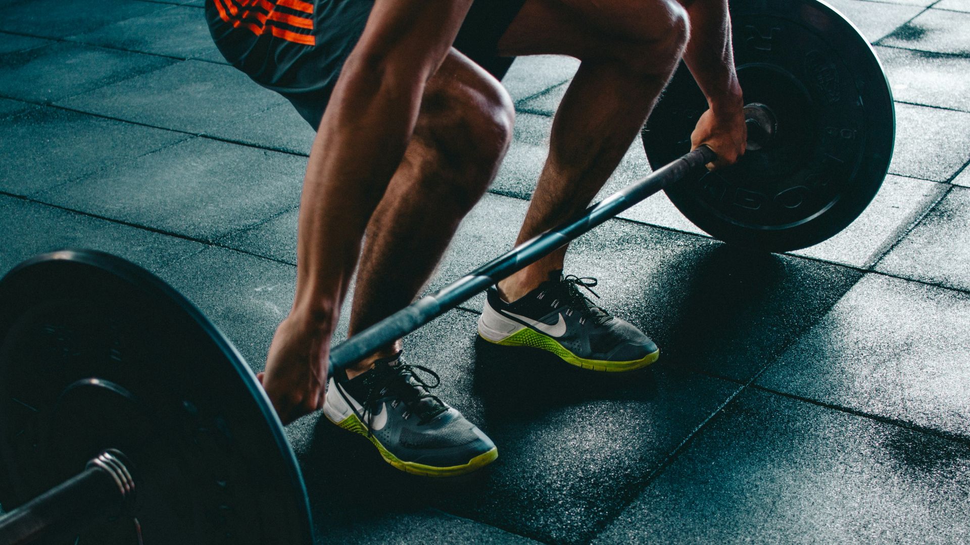 person about to lift the barbel