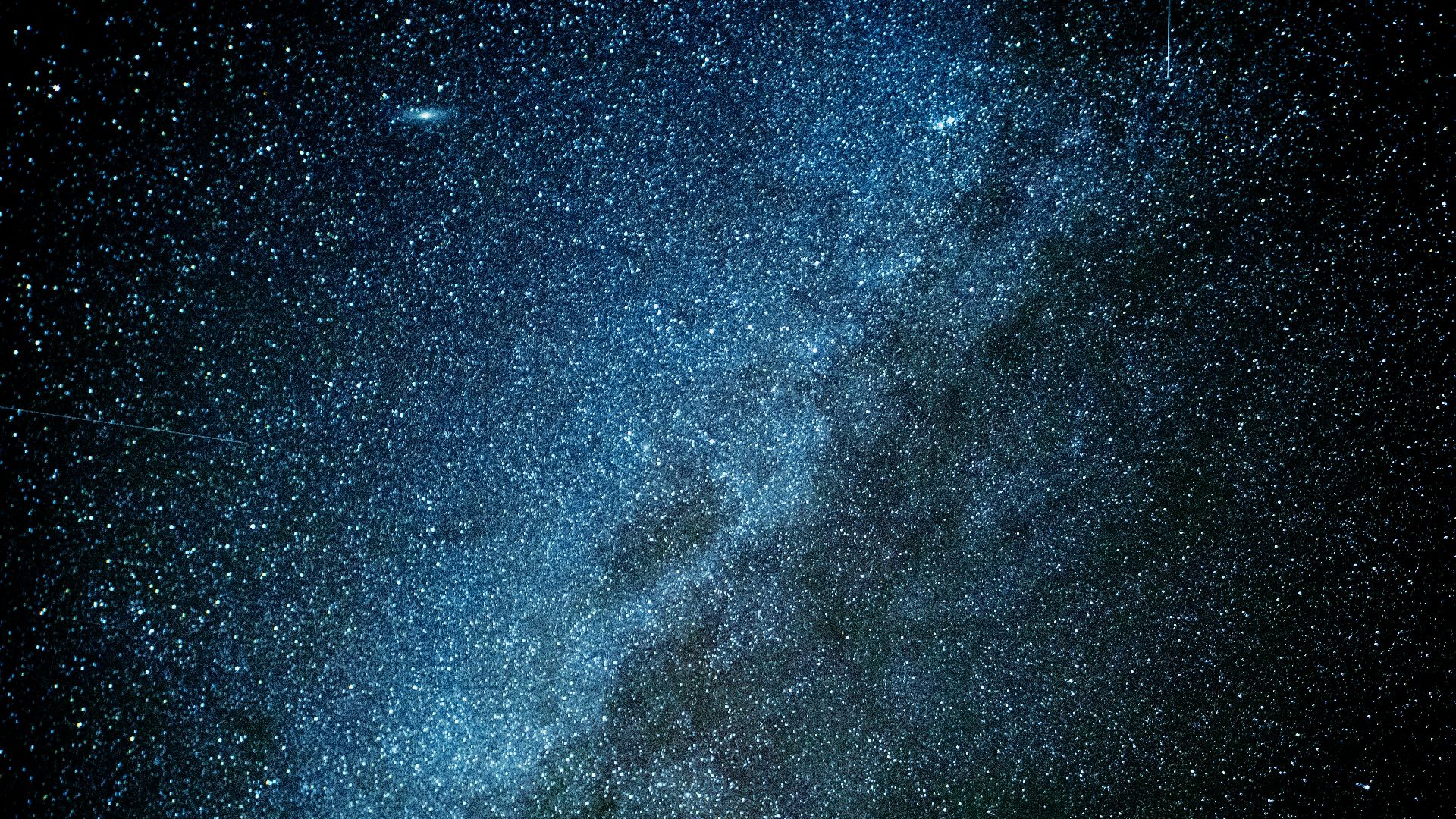 a night sky with stars and the milky