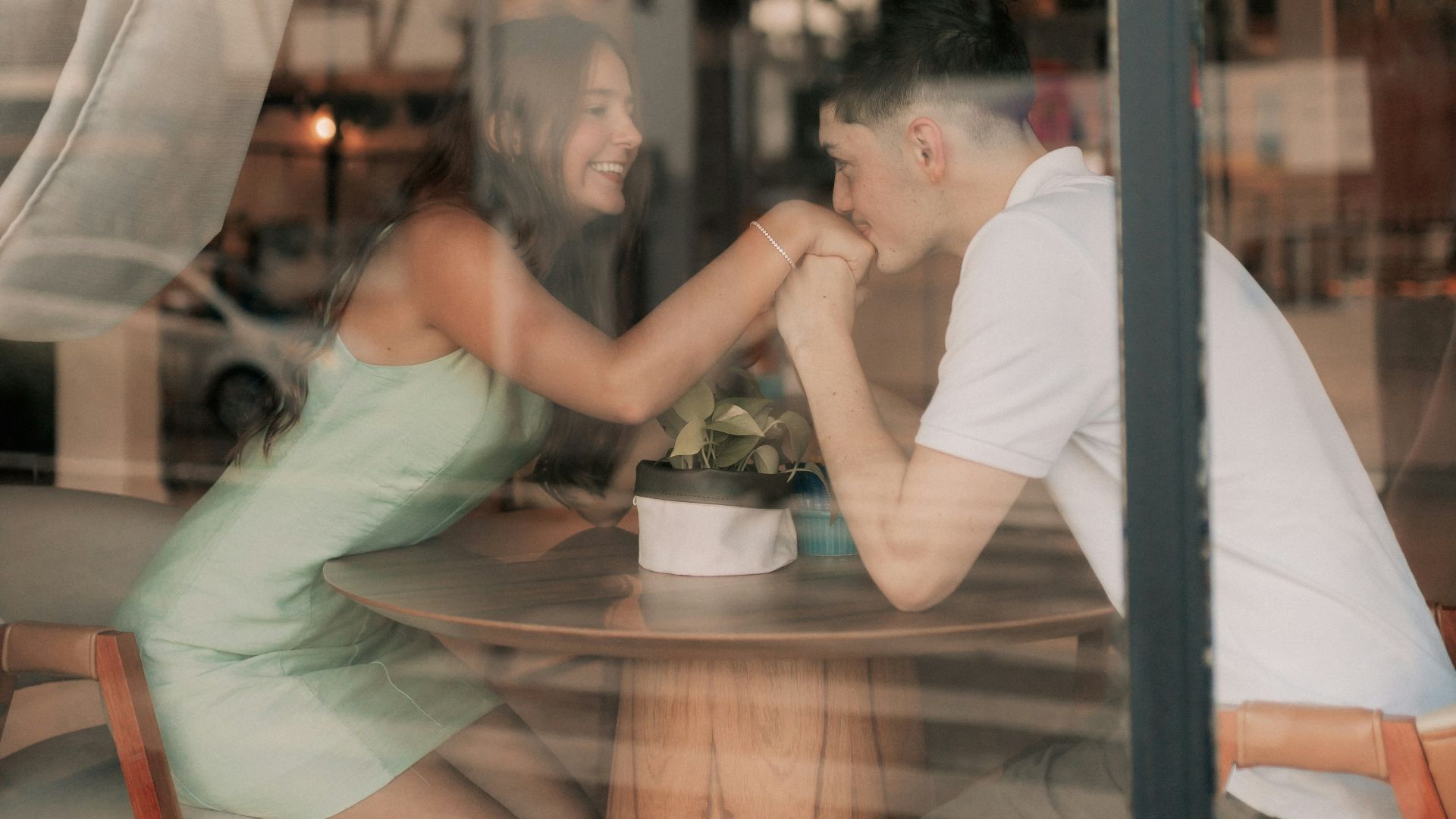 A couple is enjoying a romantic moment.