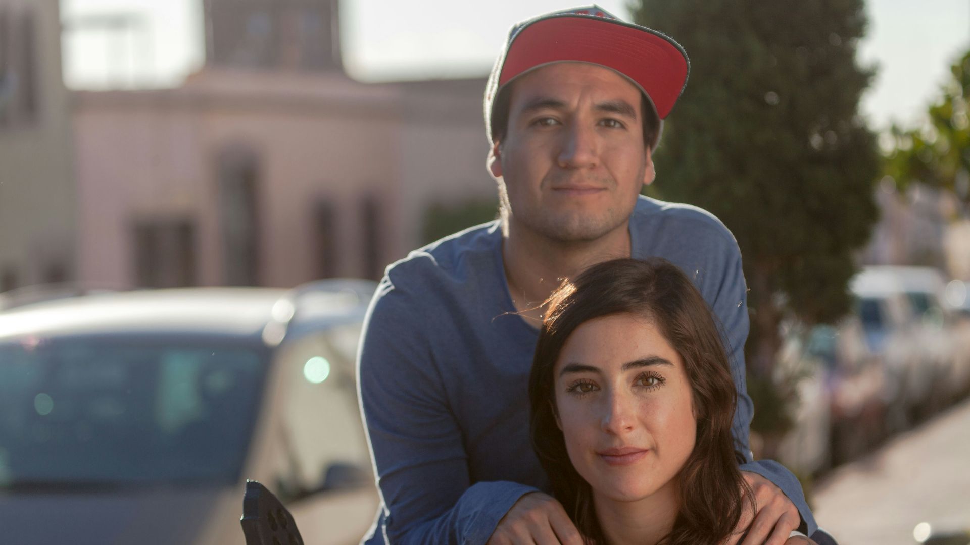 man in blue long sleeve shirt beside woman in blue long sleeve shirt