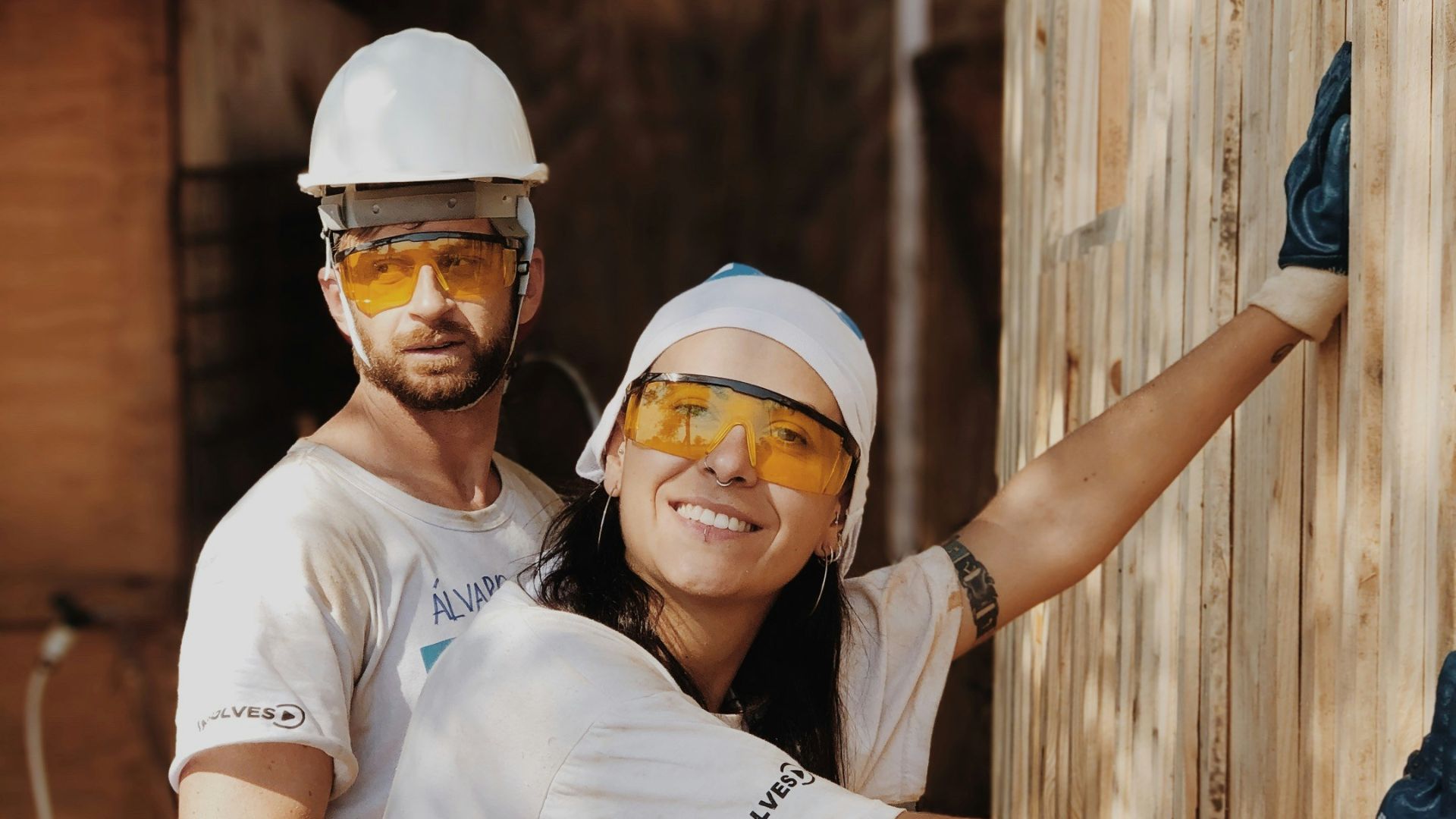 woman in white shirt wearing white helmet