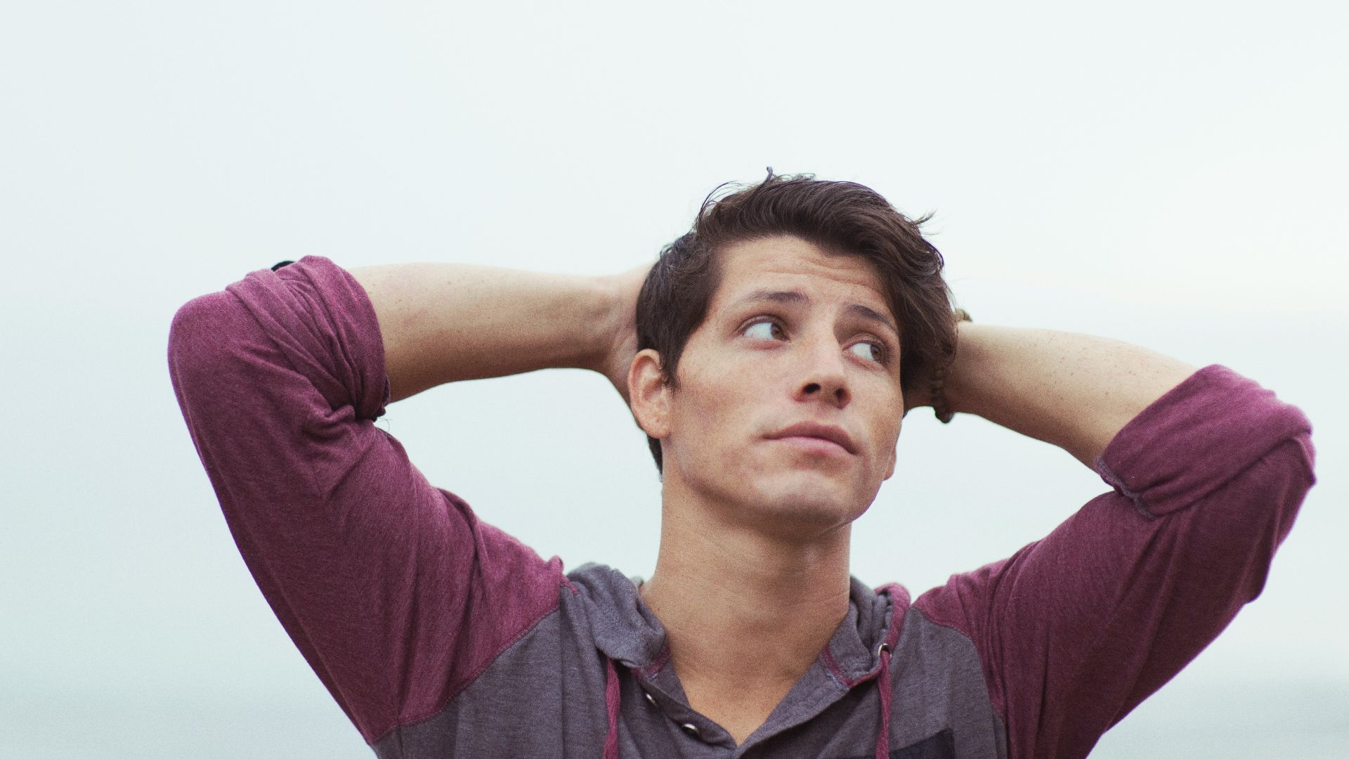 man holding his head