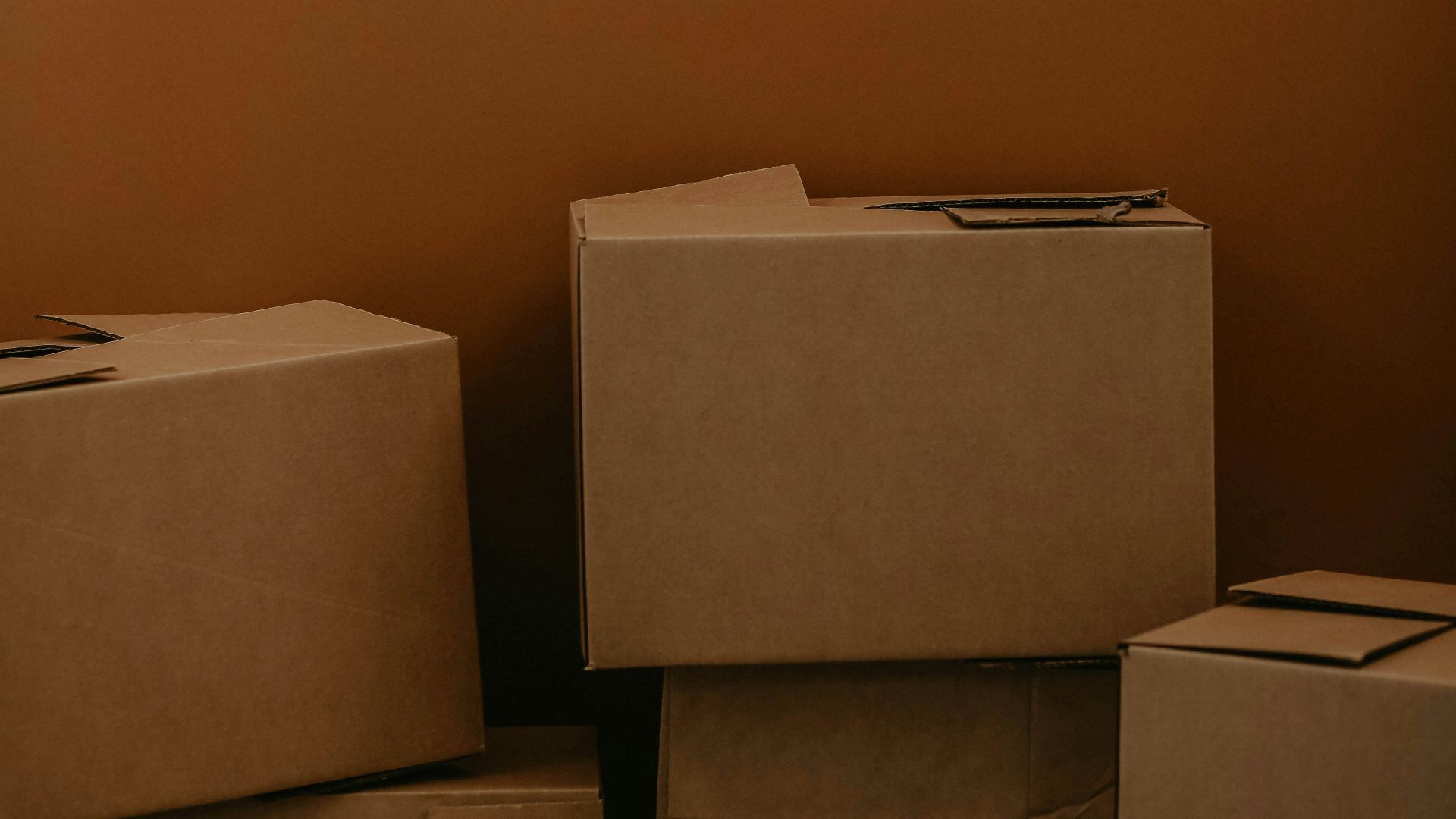white cardboard box on brown wooden table
