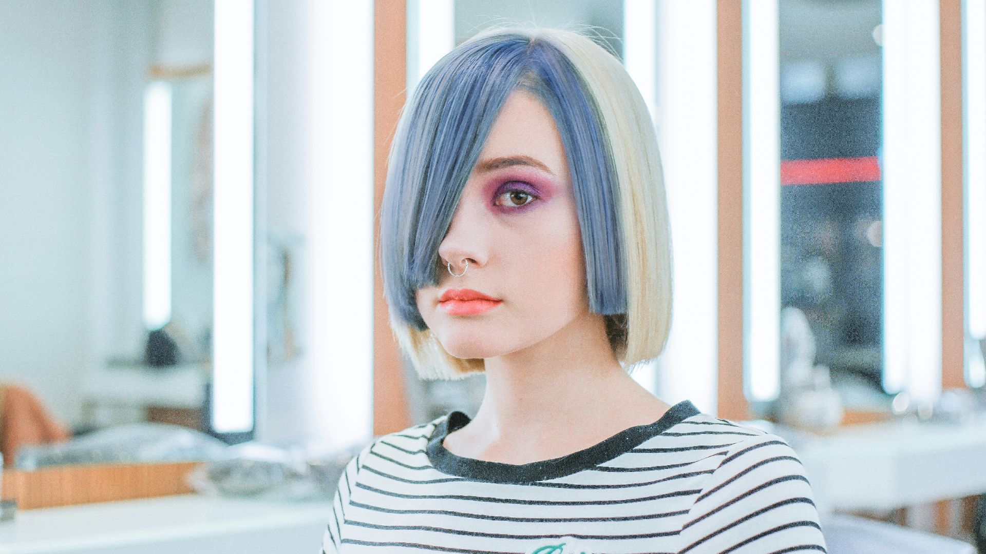 woman wearing black and white striped shirt