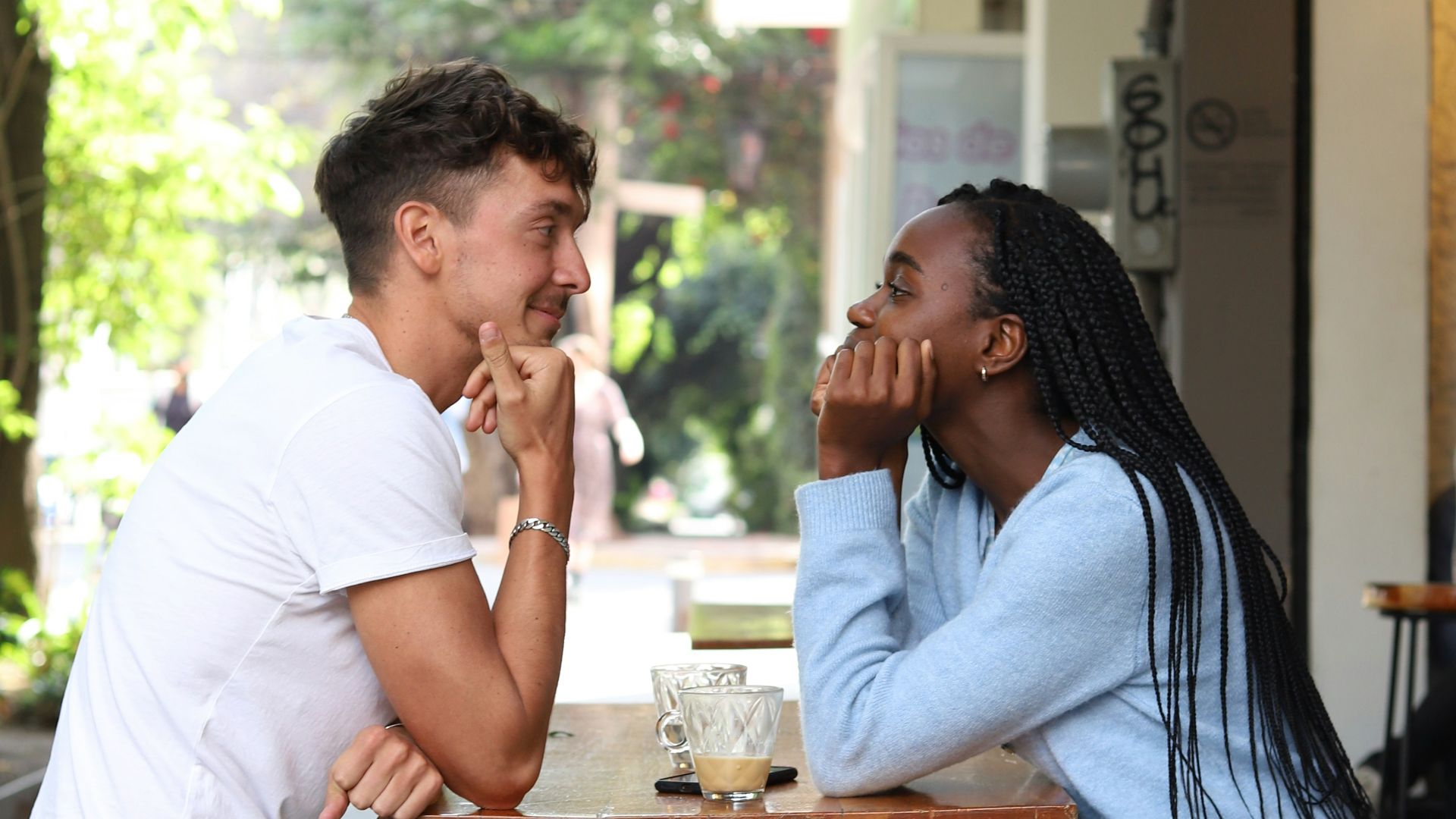 a man and a woman sitting at a table