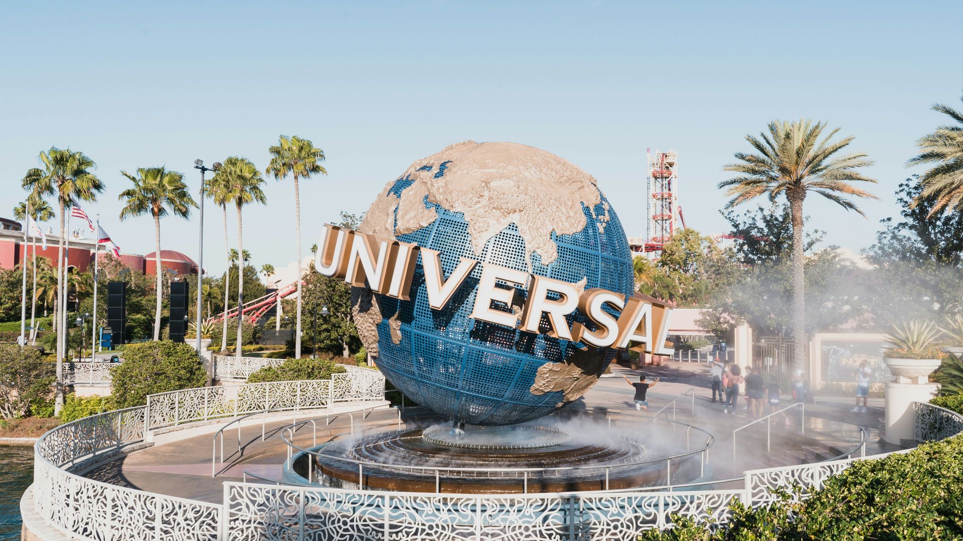 blue and white globe on fountain during daytime