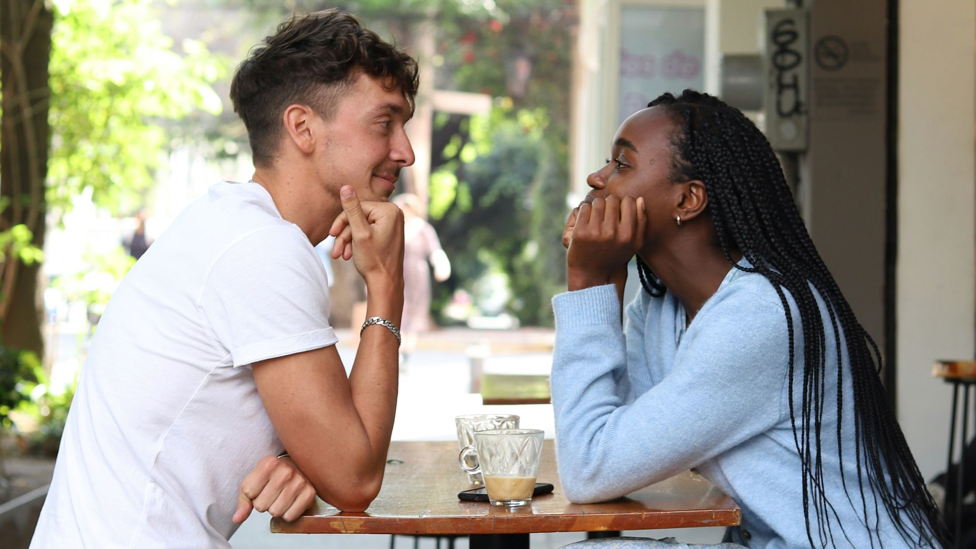 a man and a woman sitting at a table