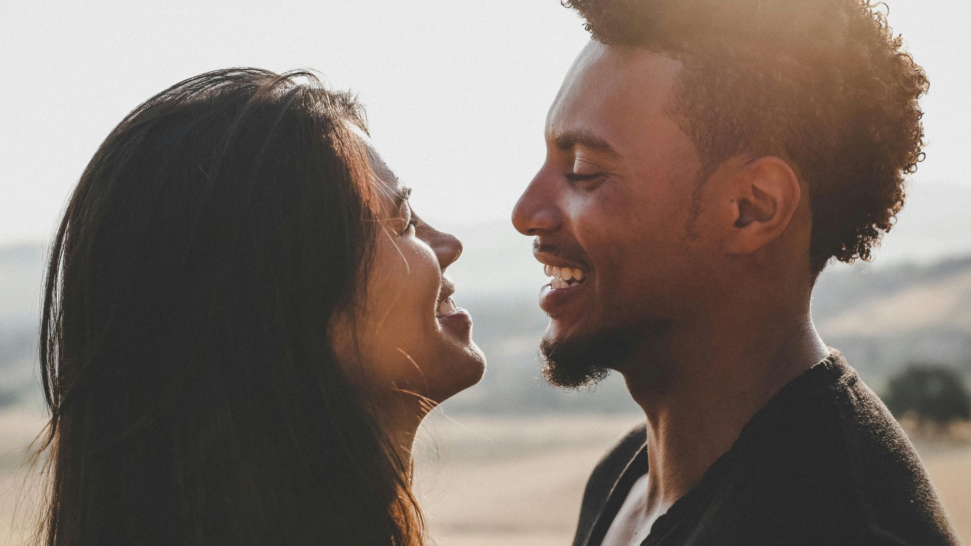 man and woman facing