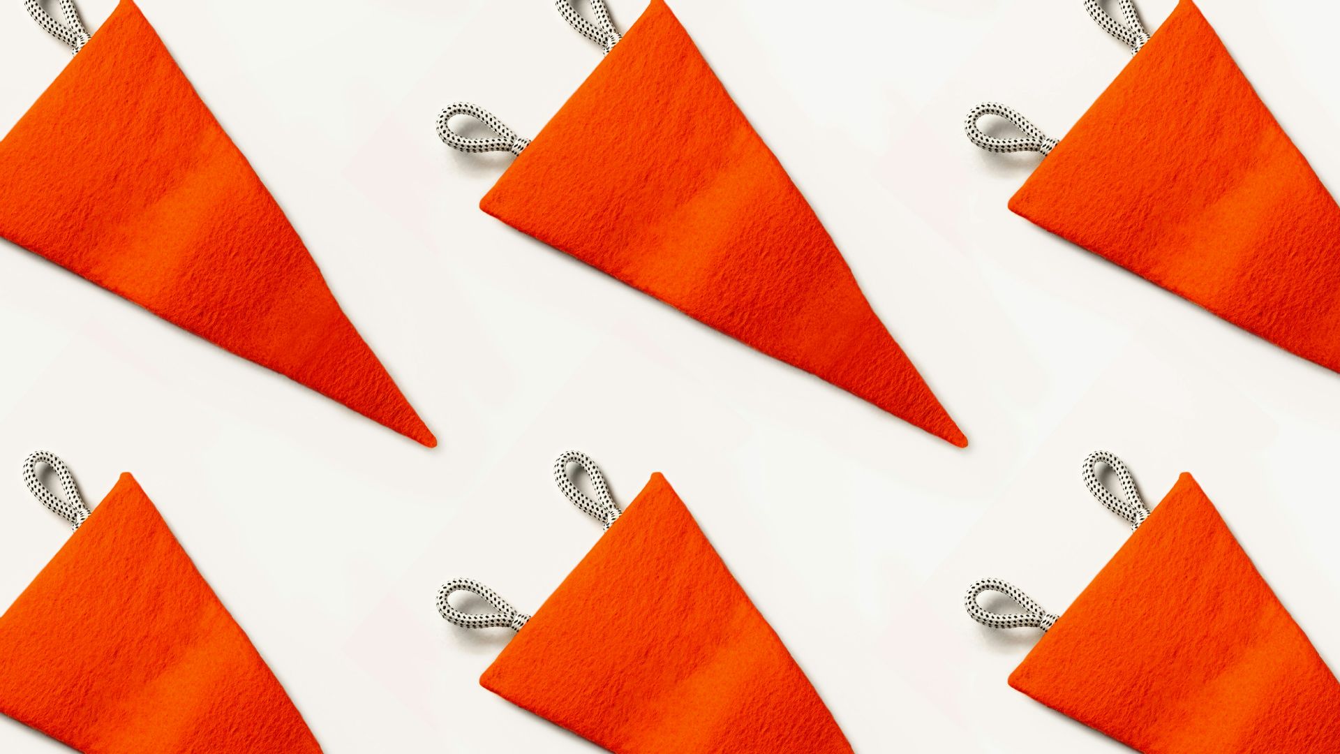 a close up of a bunch of orange triangles