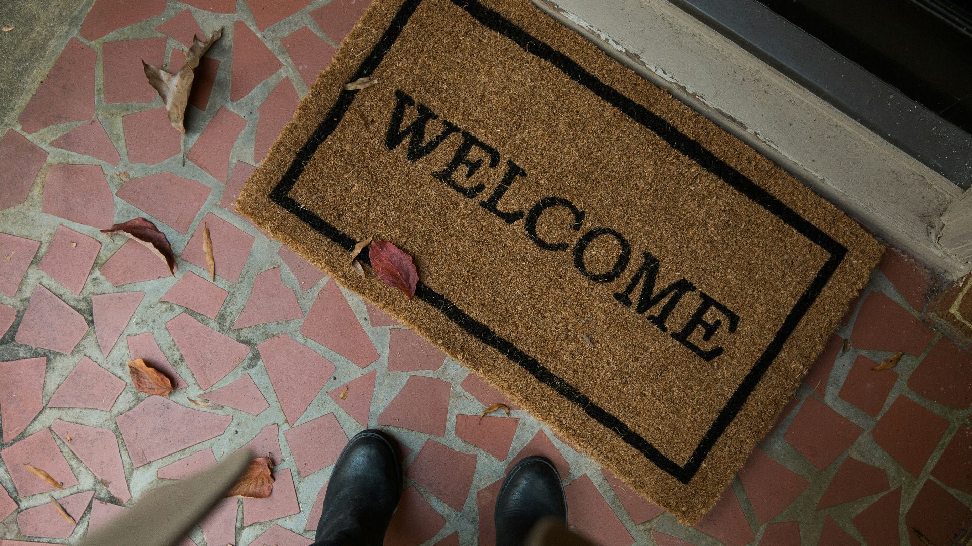 brown and beige welcome area rug