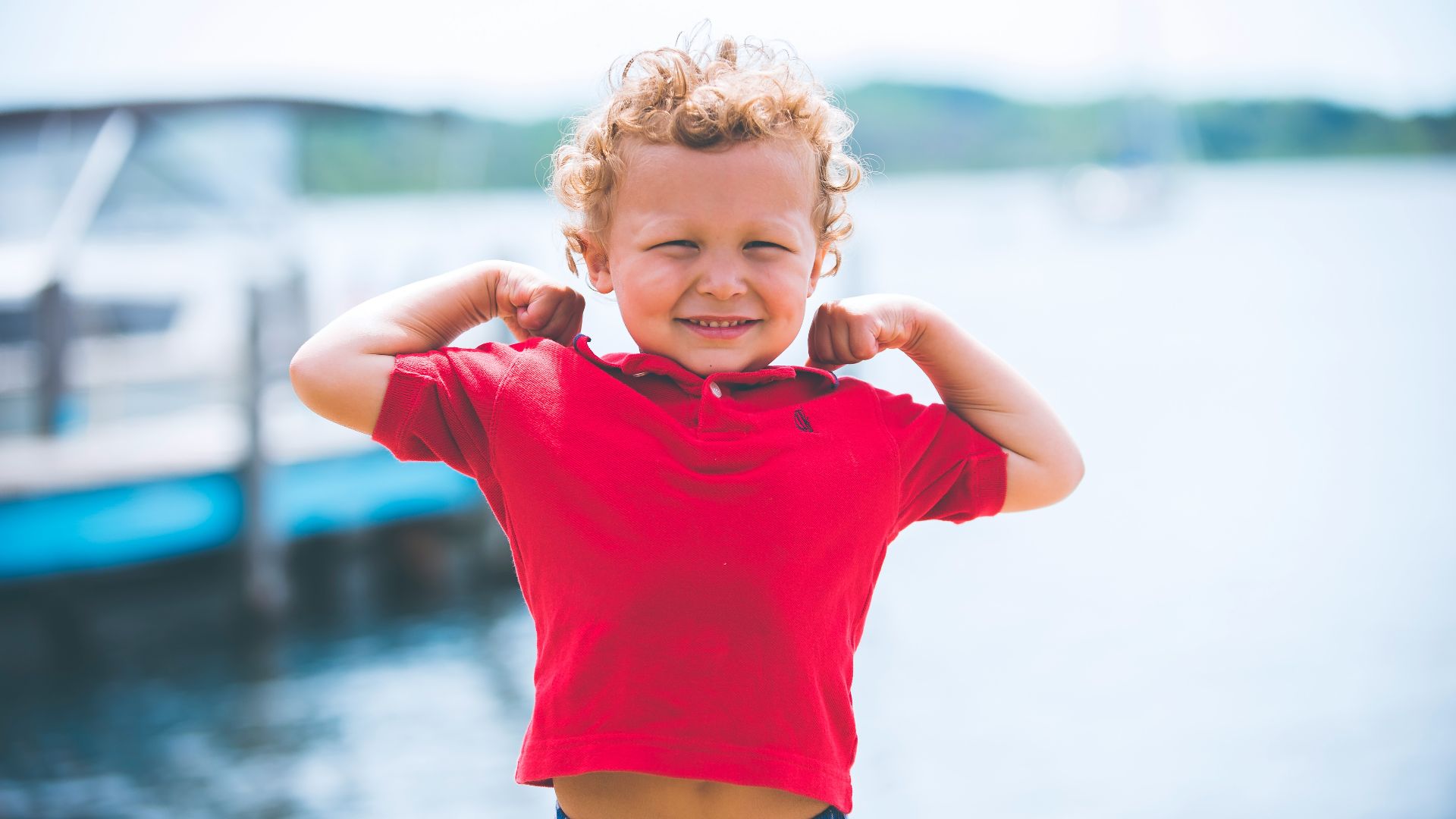 boy standing near dock