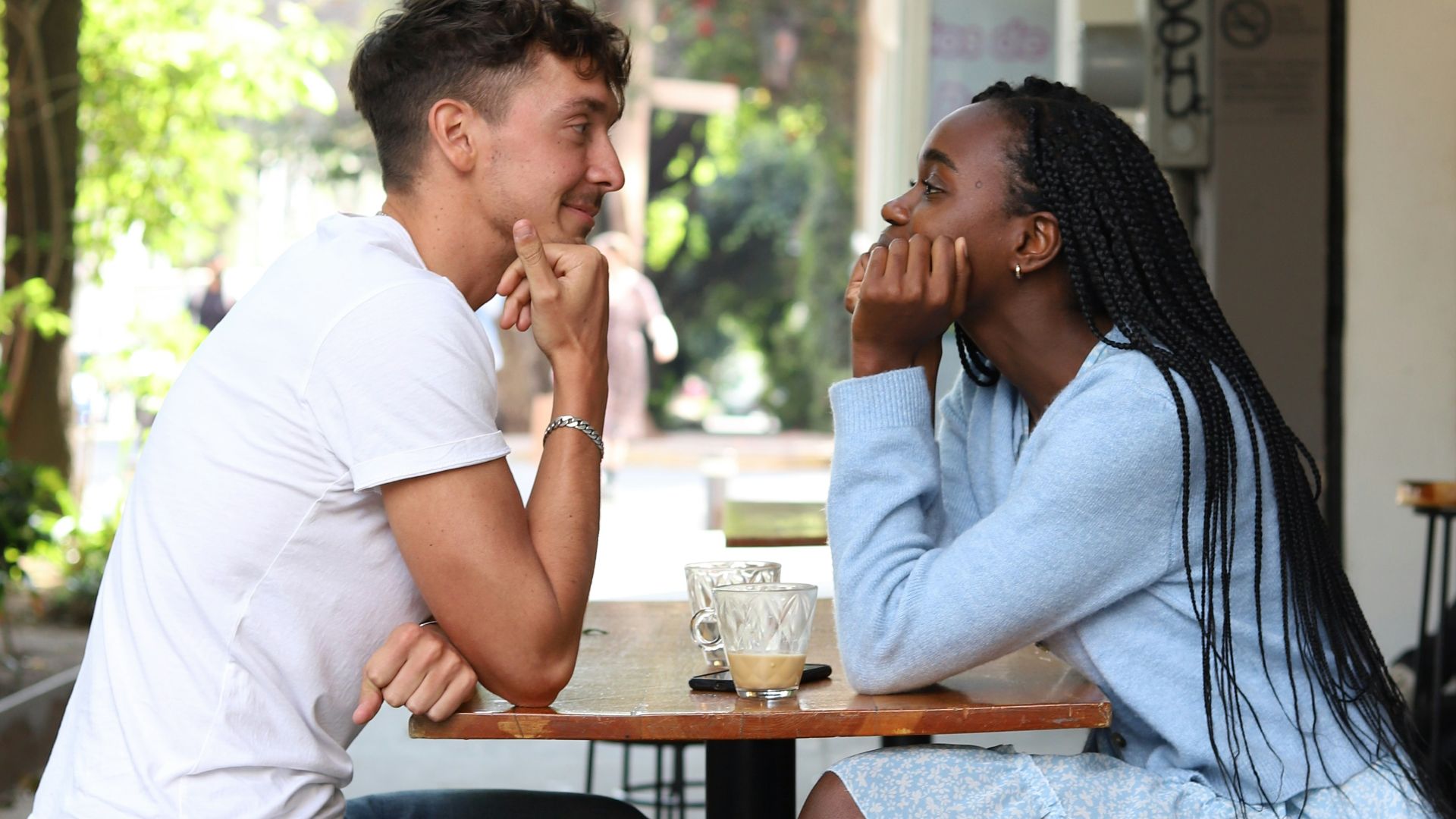a man and a woman sitting at a table