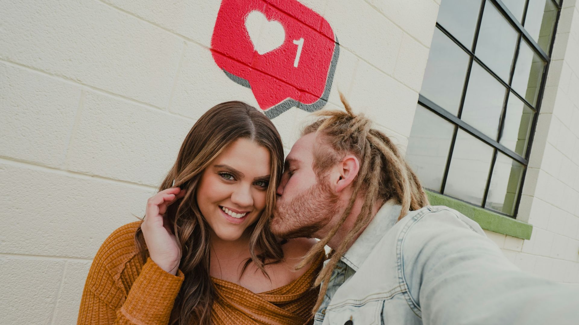 a man and a woman standing next to each other