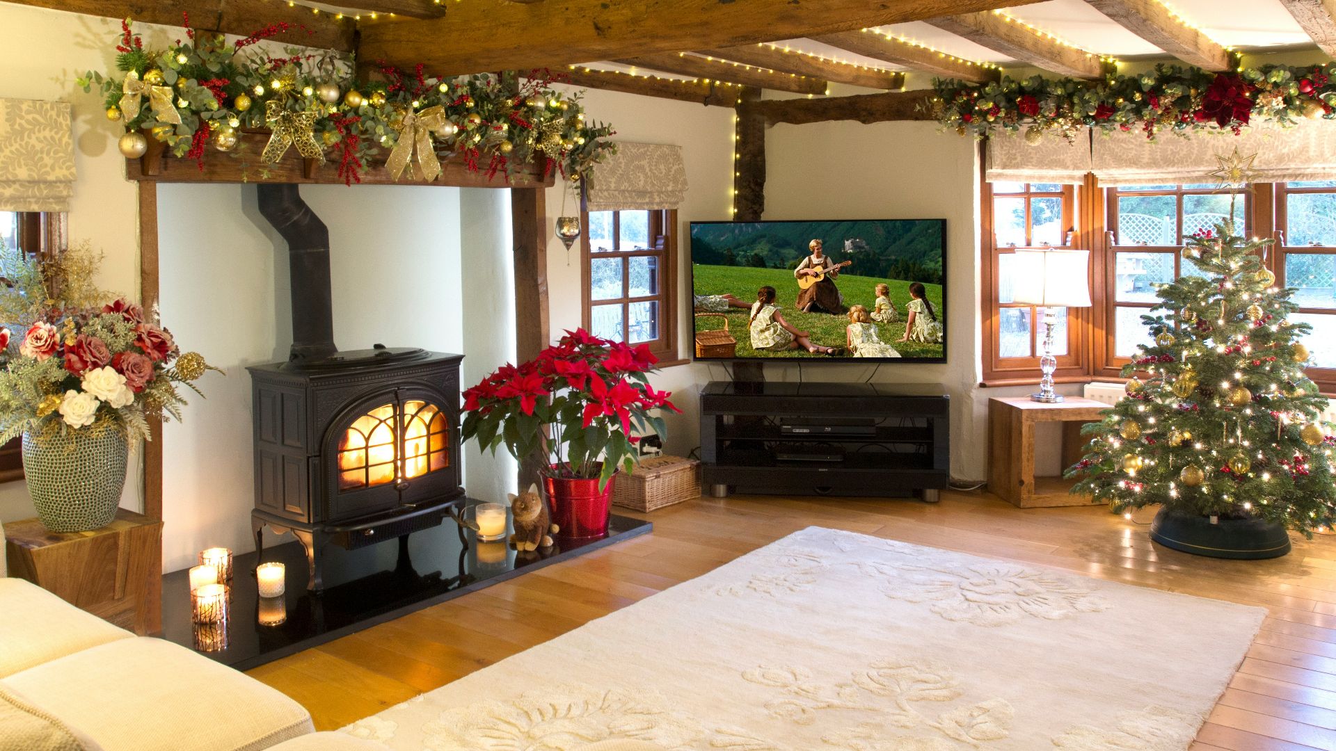 a living room filled with furniture and a fire place