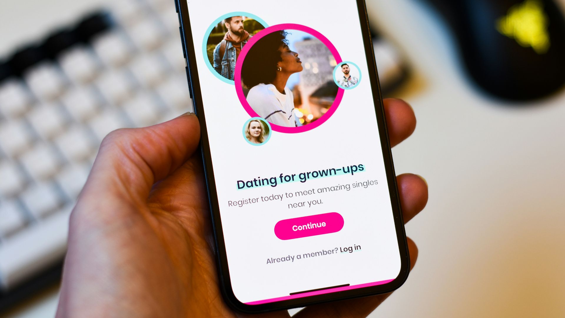 a person holding a cell phone in their hand