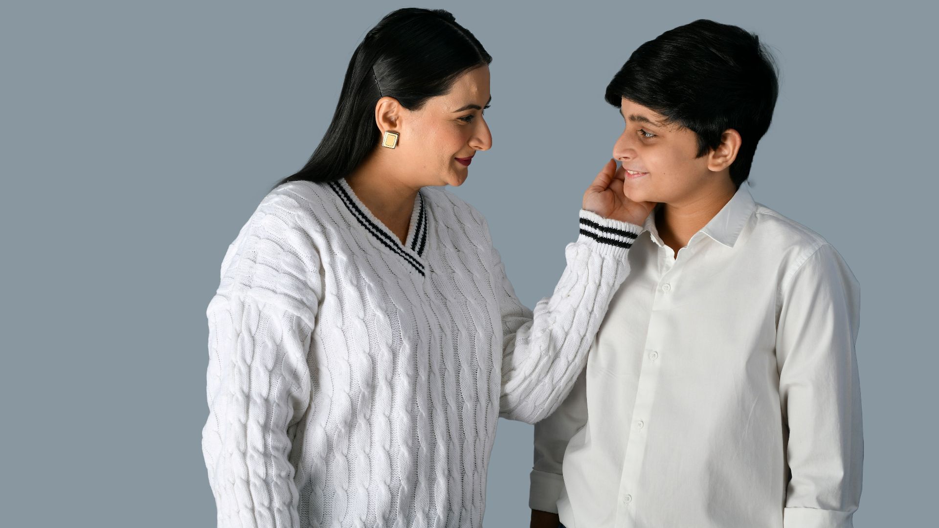 a man and woman looking at each other