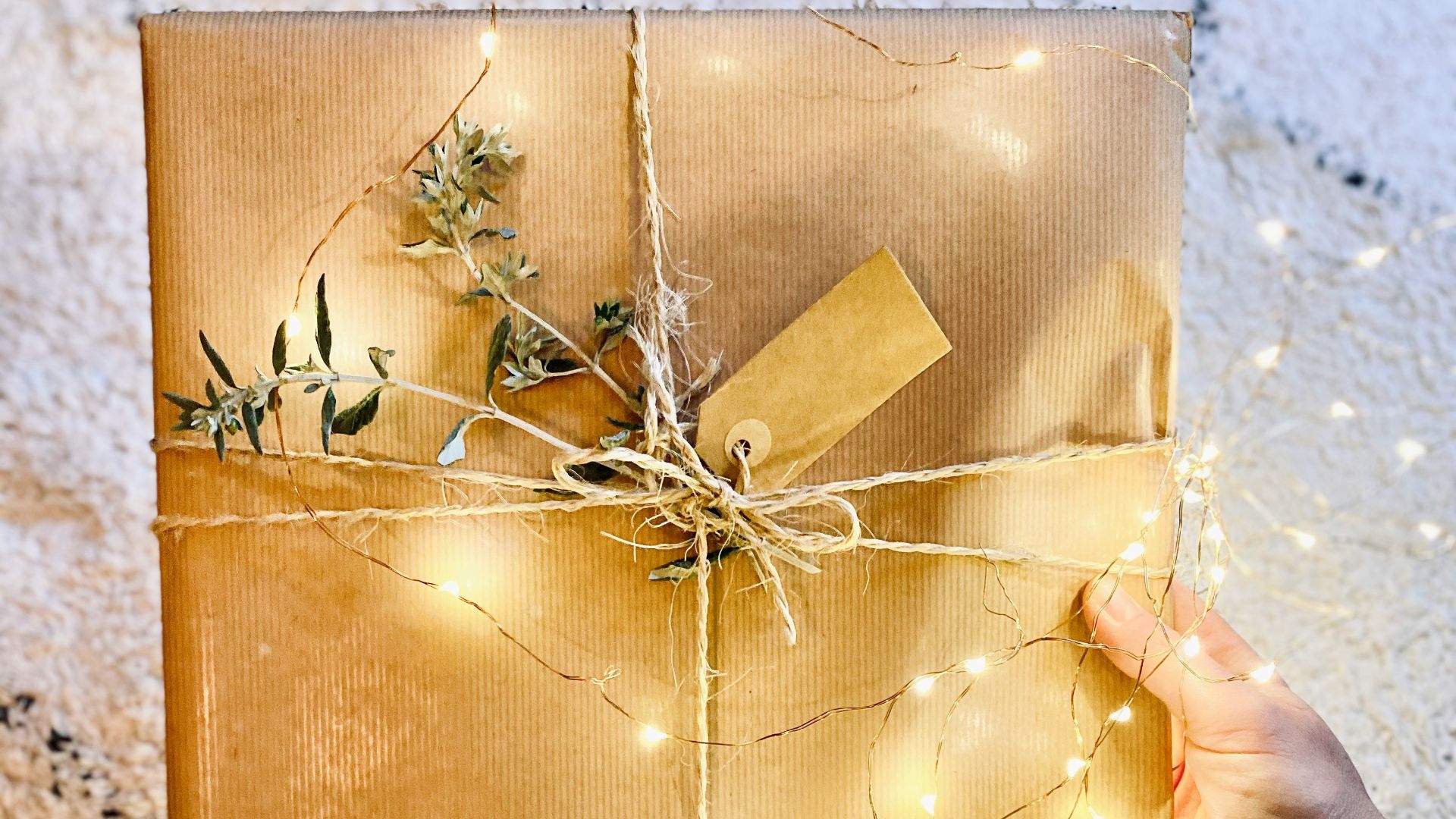 brown gift box on white and black marble table