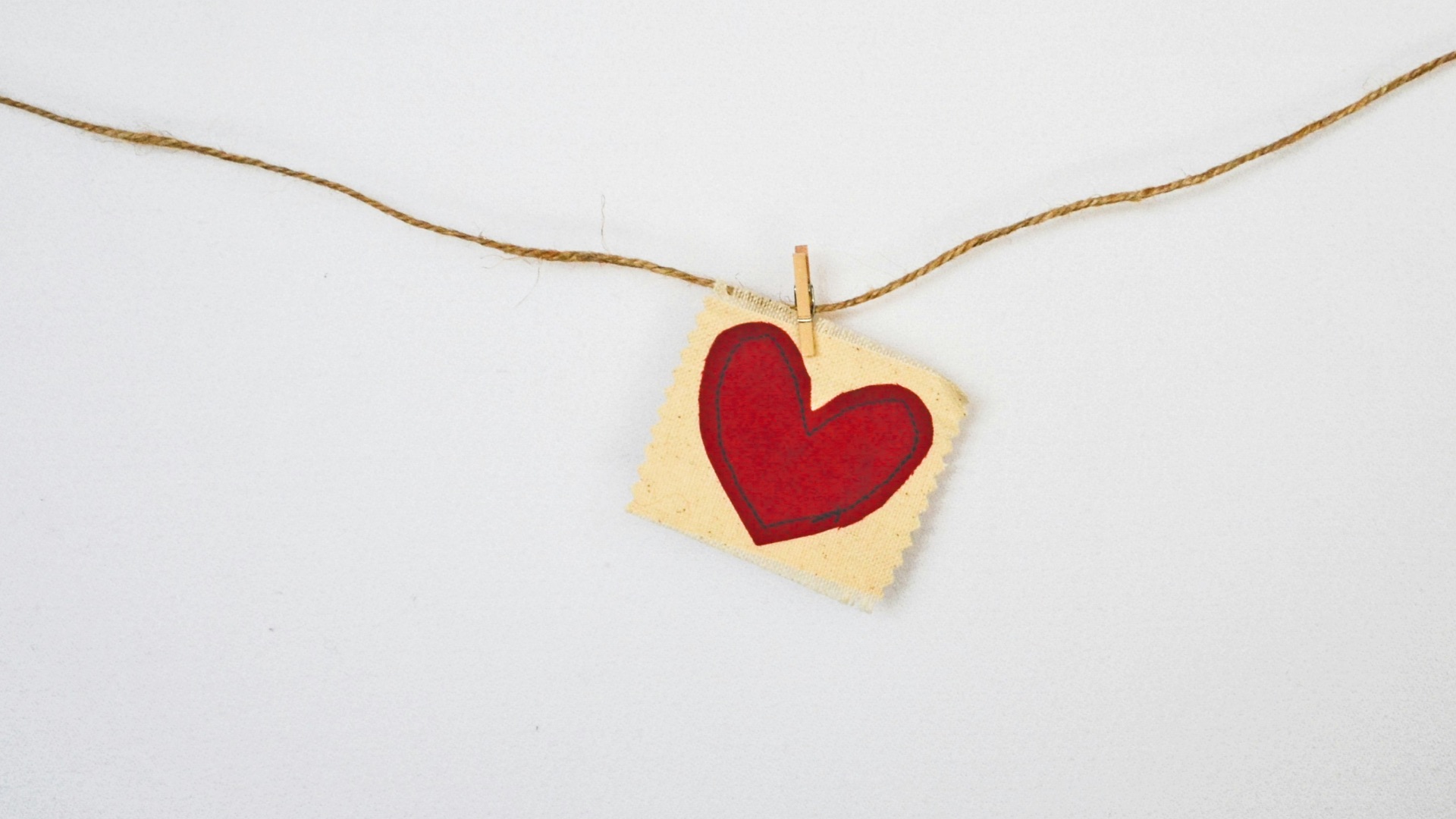 heart-shaped red and beige pendant