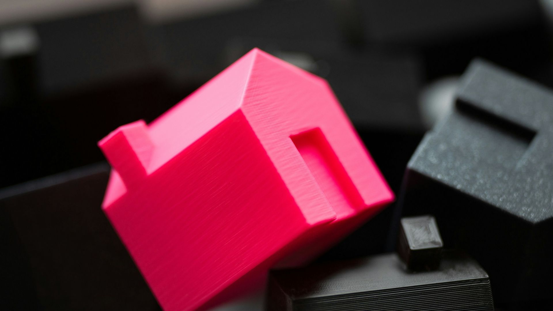 A group of black and pink objects sitting on top of a table