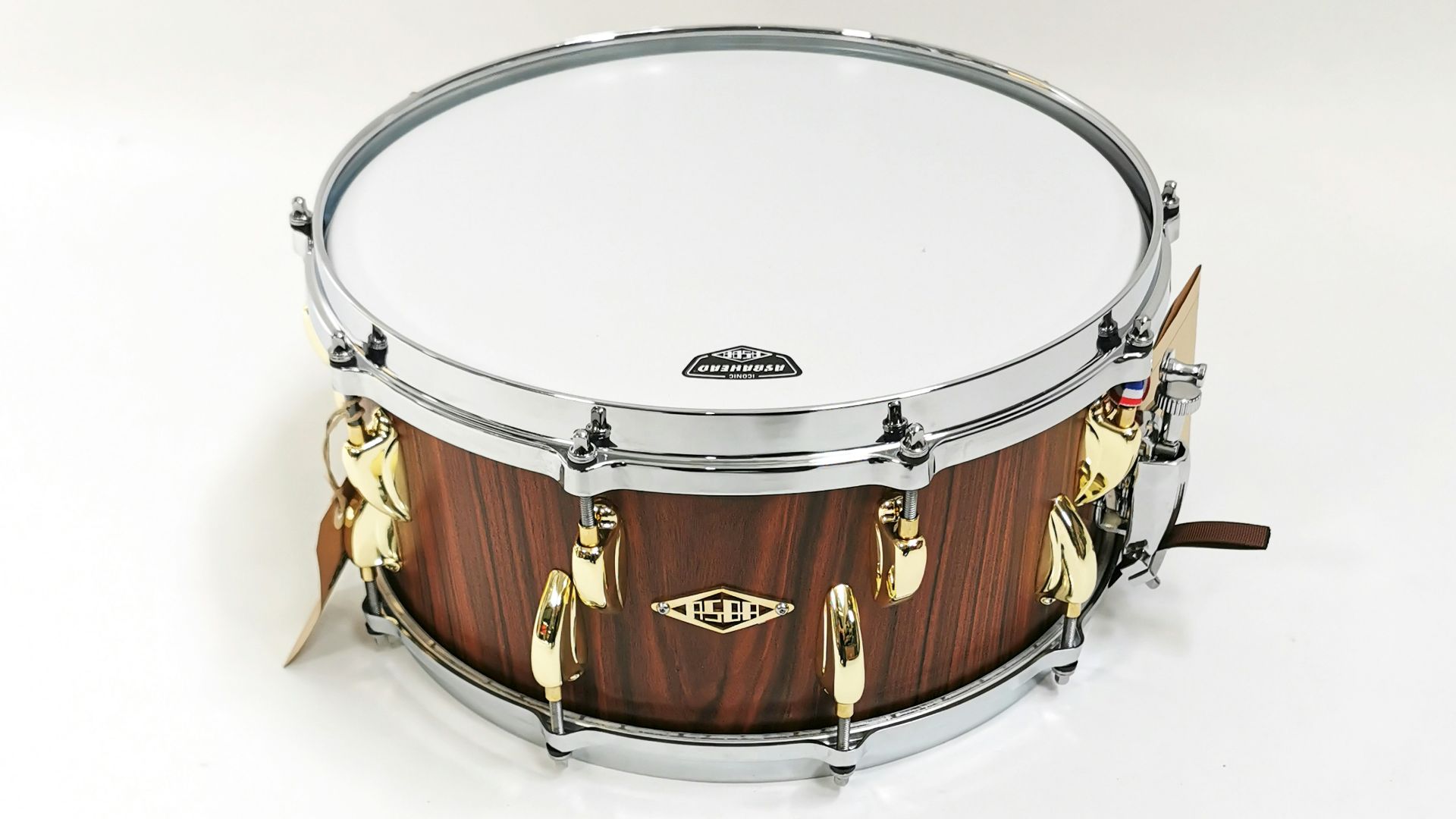 brown and white drum set