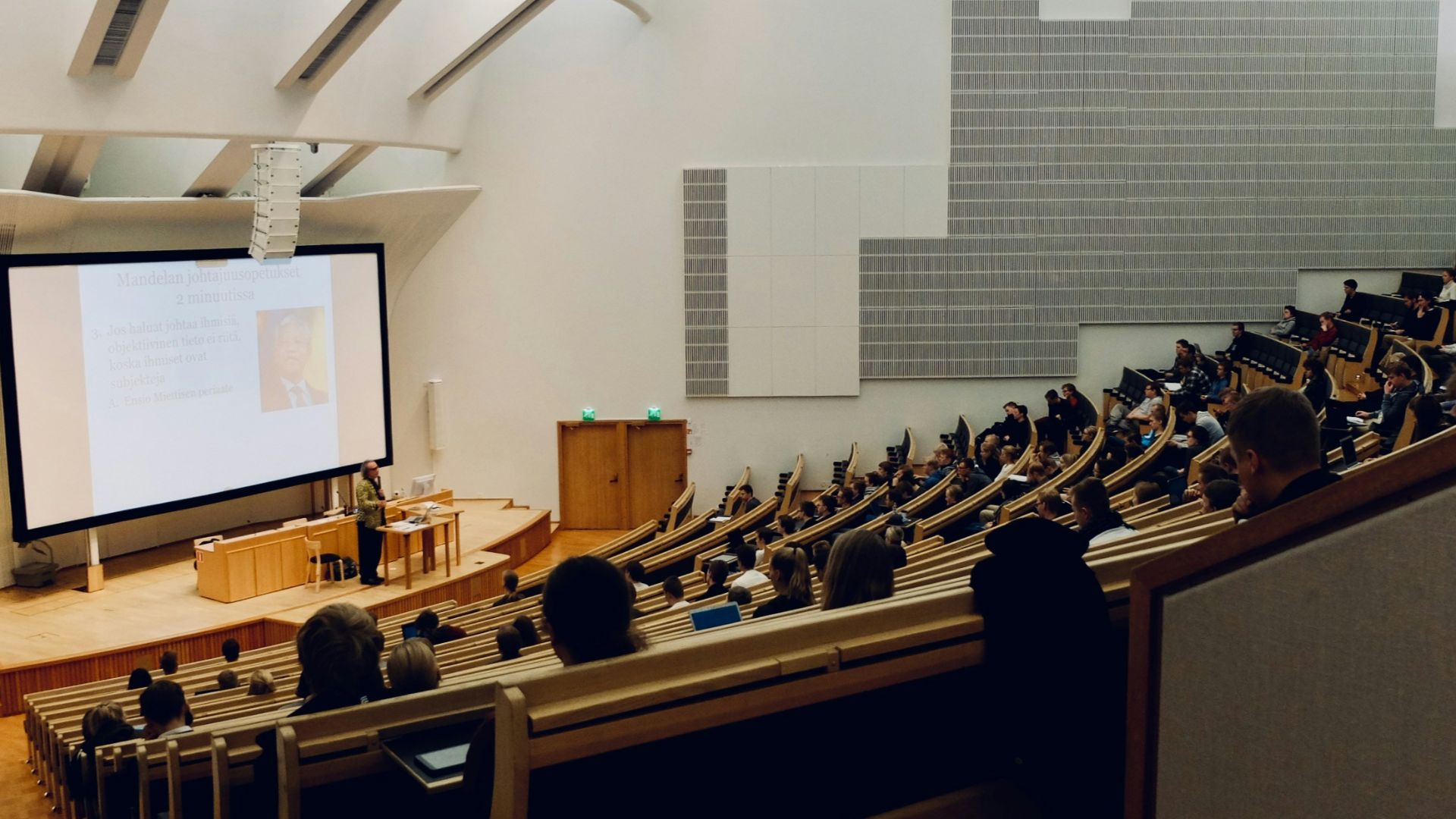 people sitting on chair in front of computer